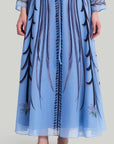 Altuzarra Roxana Skirt. Sky blue, navy blue and violet highlight. Hand painted skirt with adjustable tied at the waist. Midi length. Natural pattern. Shown on model facing front