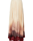 Altuzarra Sif Skirt A tailored maxi skirt with a straight high waistband and a voluminous pleated skirt. Made from 100% Italian silk it is dip dyed in an ombre of in cranberry to ivory coloring. Product photo facing front.