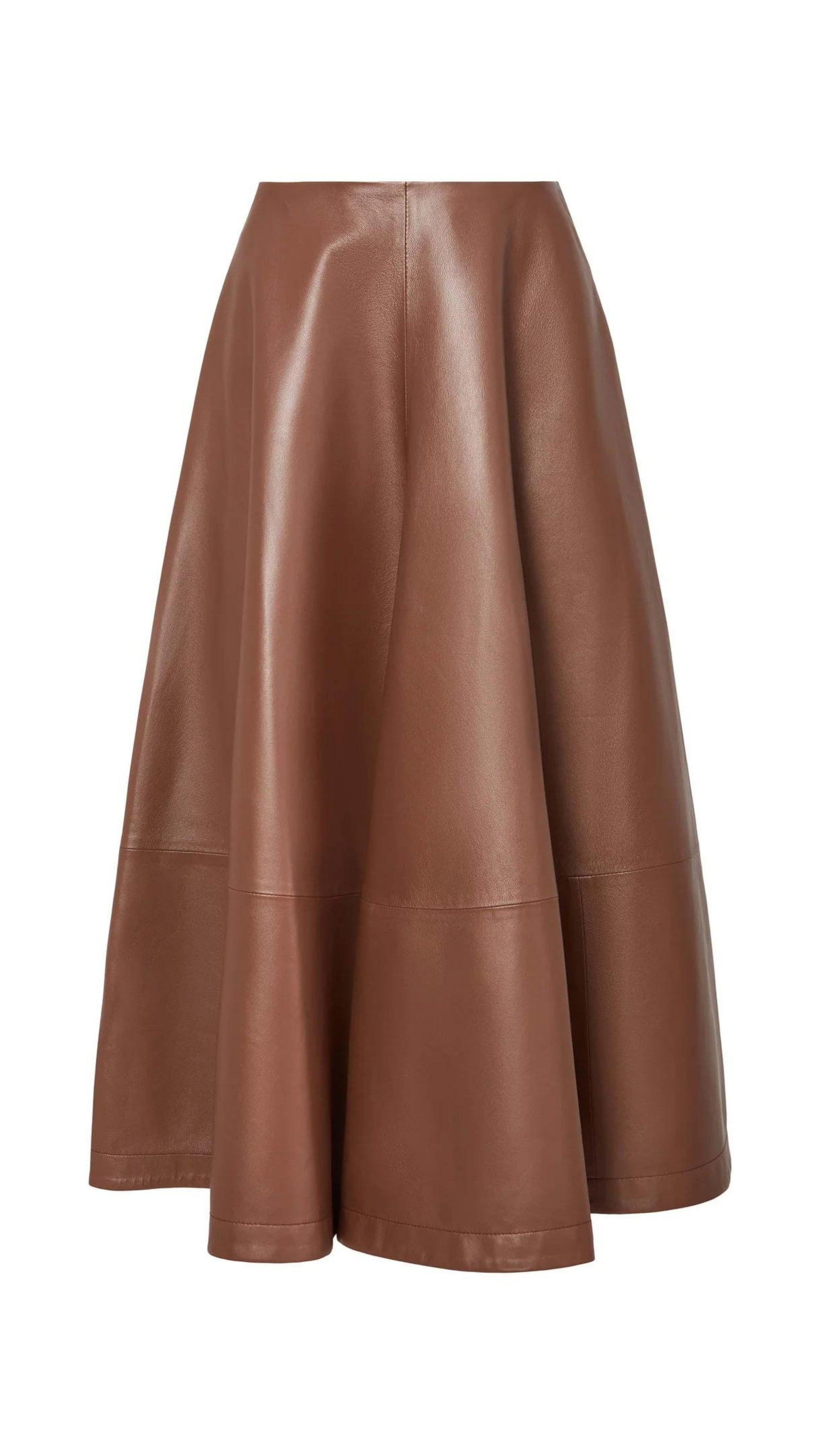 Altuzarra Varda Skirt Made from soft, subtle brown lamb leather, it has an A-line skirt. Midi-length SS24 runway piece. The skirt hem falls to just below the knee. Product photo from the front.