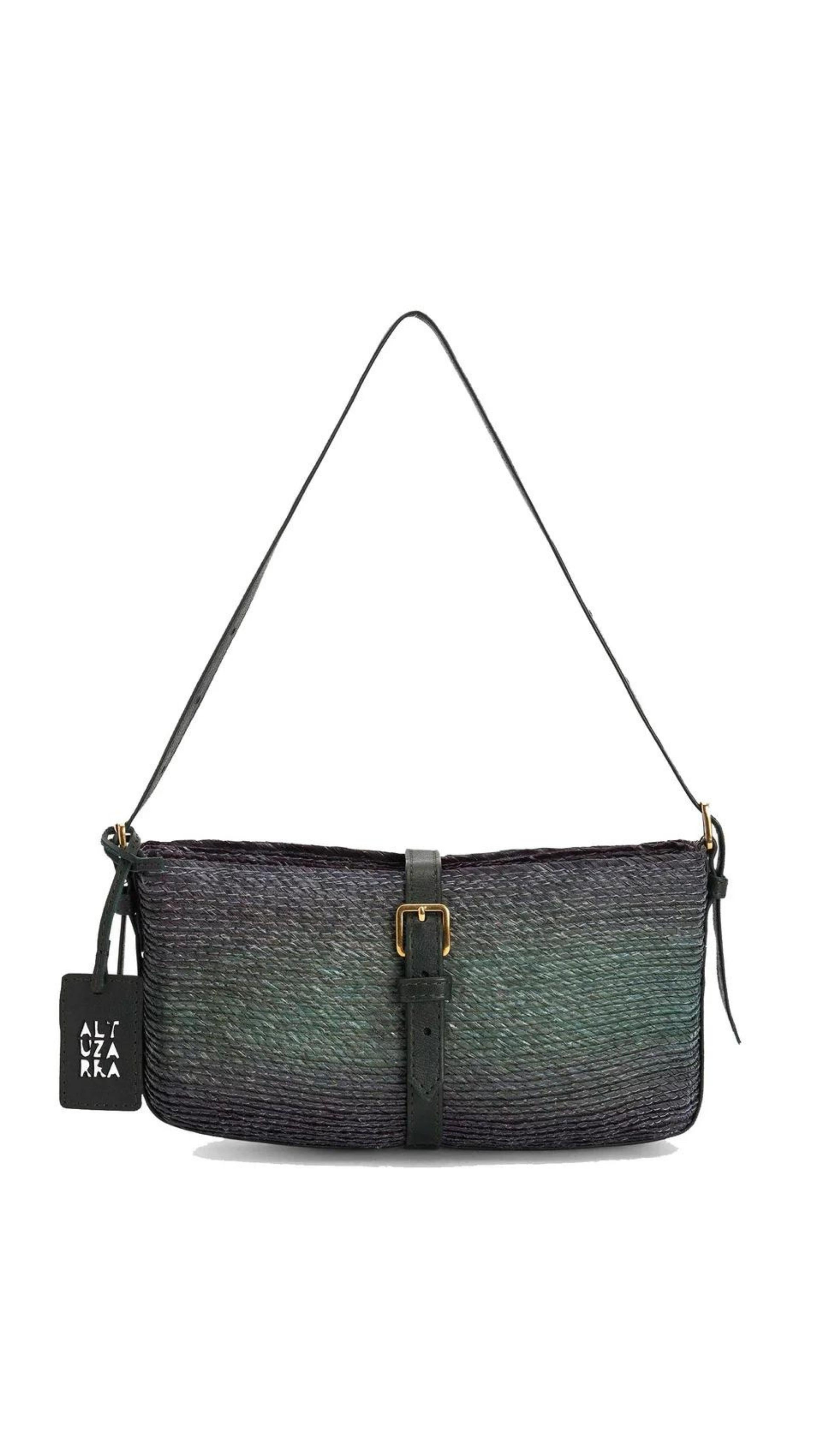 Altuzarra Watermill Shoulder Bag in Campo. Small clutch sized raffia purse in a green and dark blue ombre tone. With navy blue leather details and gold hardware. Photo shown front view. Available at experience 27 in Madrid Spain.