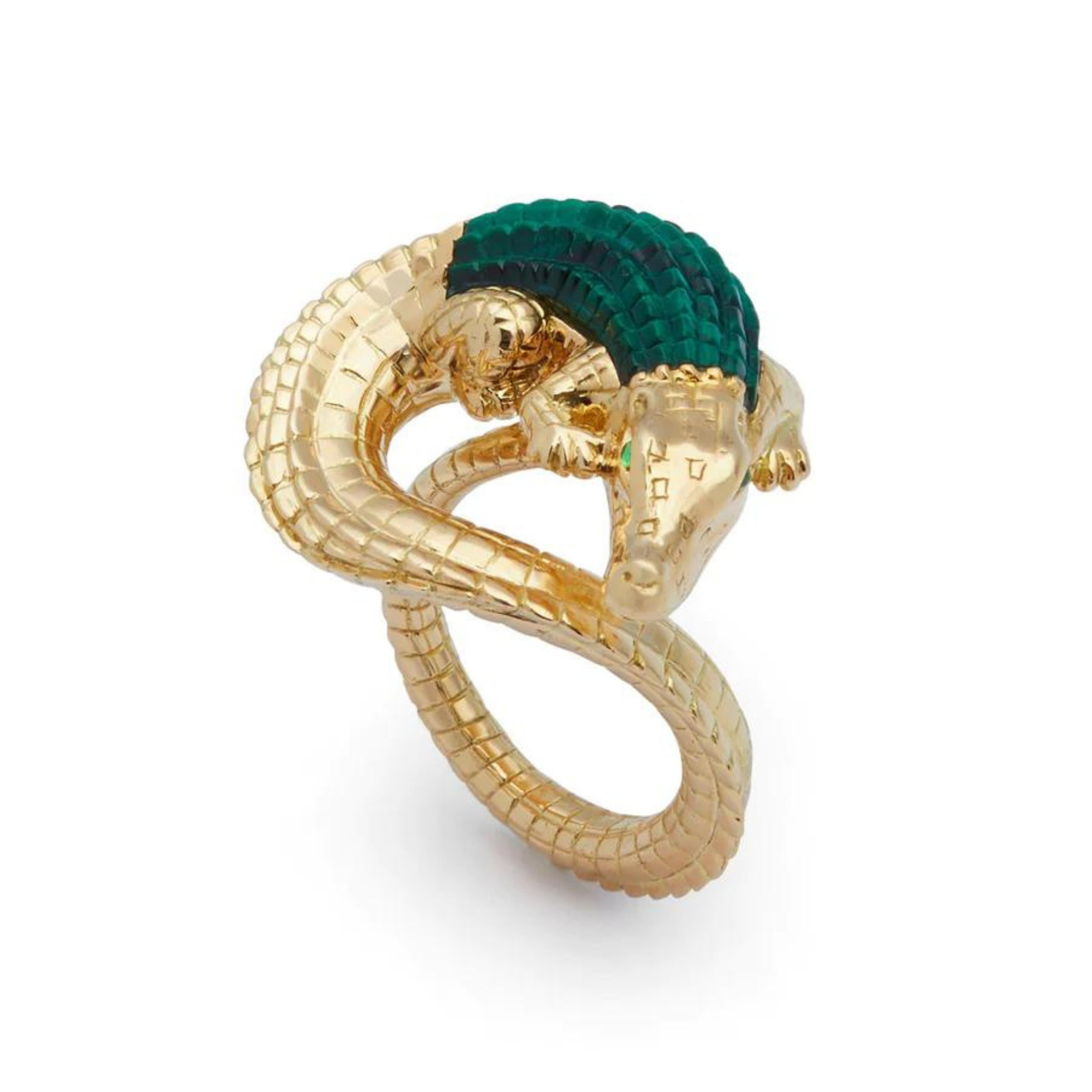 Bibi van der Velden Alligator Twist Ring in Malachite. An intricately carved ring crafted from 18K Gold with a malachite stone alligator body. The alligator is twisted from tail to nose and the ring is set beneath the scultpure. Photo shown from the top view.