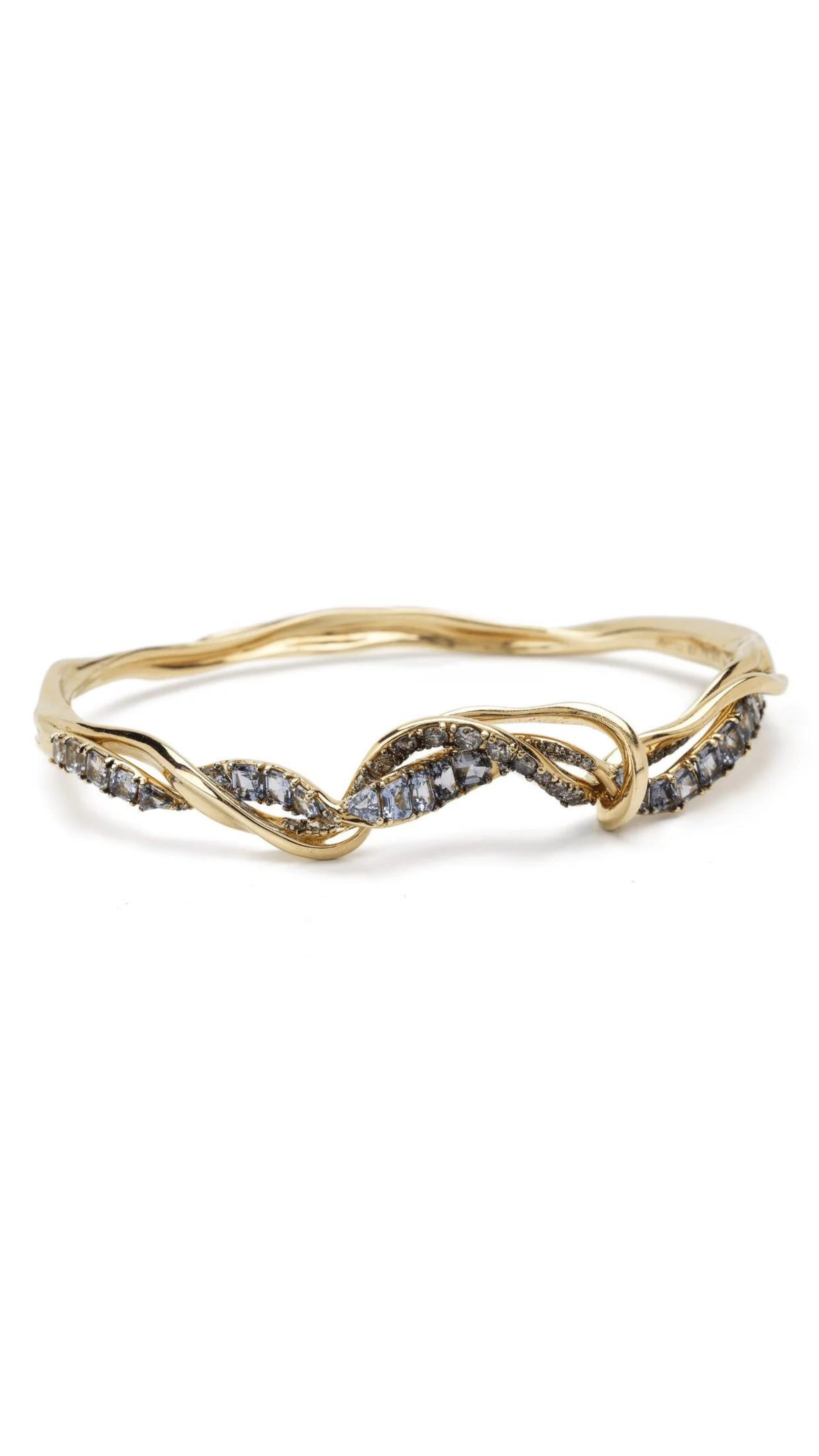 Bibi van der Velden Diamond Vapour Bangle - Bangle style bracelet created in interwoven 18K gold and set with white and grey diamonds. Product photo shown from the front.