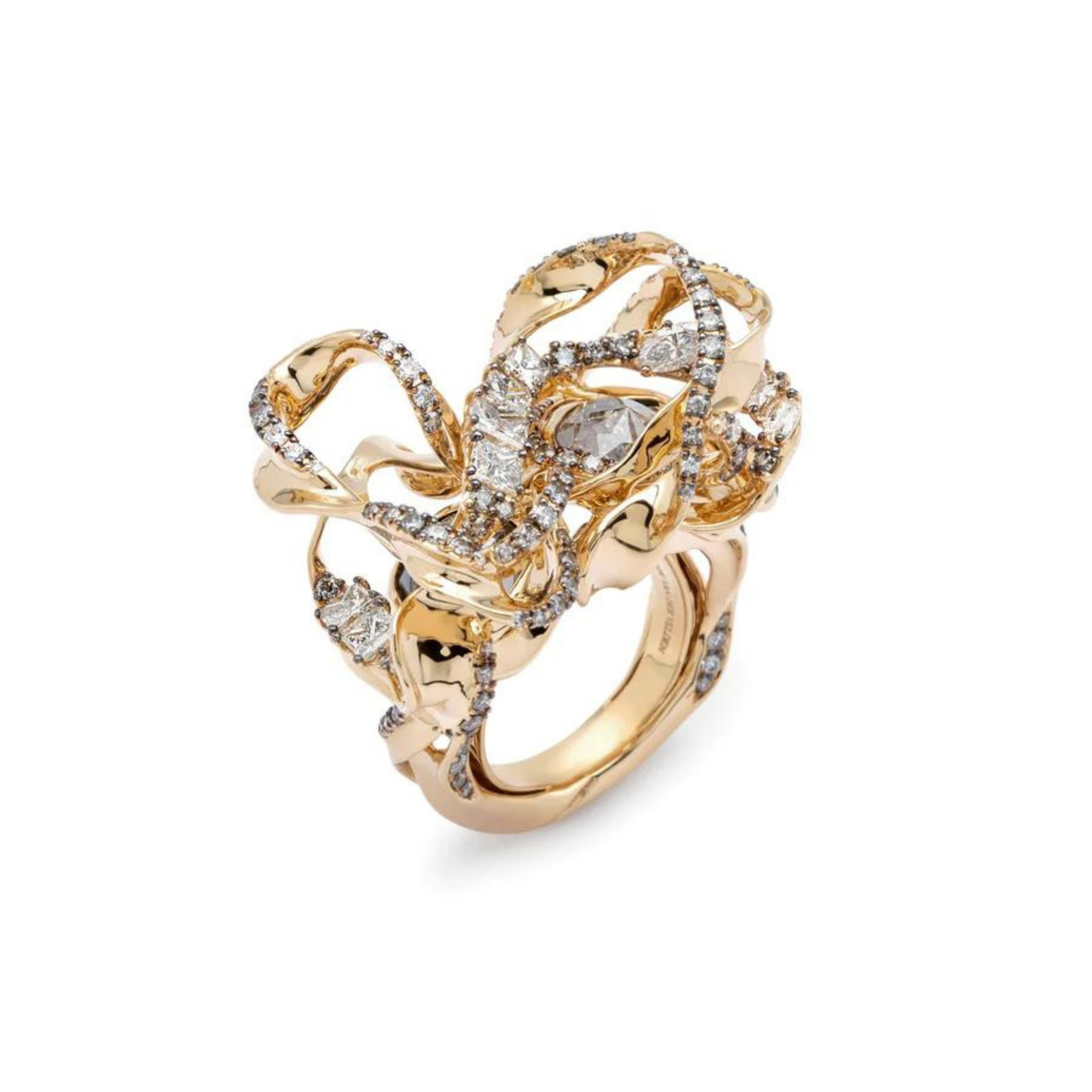 Bibi van der Velden Infinity Smoke Ring with Diamonds. One-of-a-kind infinity ring is crafted in 18K yellow gold and set with white diamonds and gray diamonds. Its center features two rose-cut salt and pepper diamonds framed by graduated, organic cuts that shine like polished smoke. Side view.