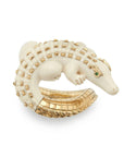 Bibi van der Velden Mammoth Alligator Twist Ring. Crafted in mamoth tusk in the shape of an alligator that curves around the finger. The tail is made from 18K gold and the ivory body has 18K gold studs. The ring is shown from above.