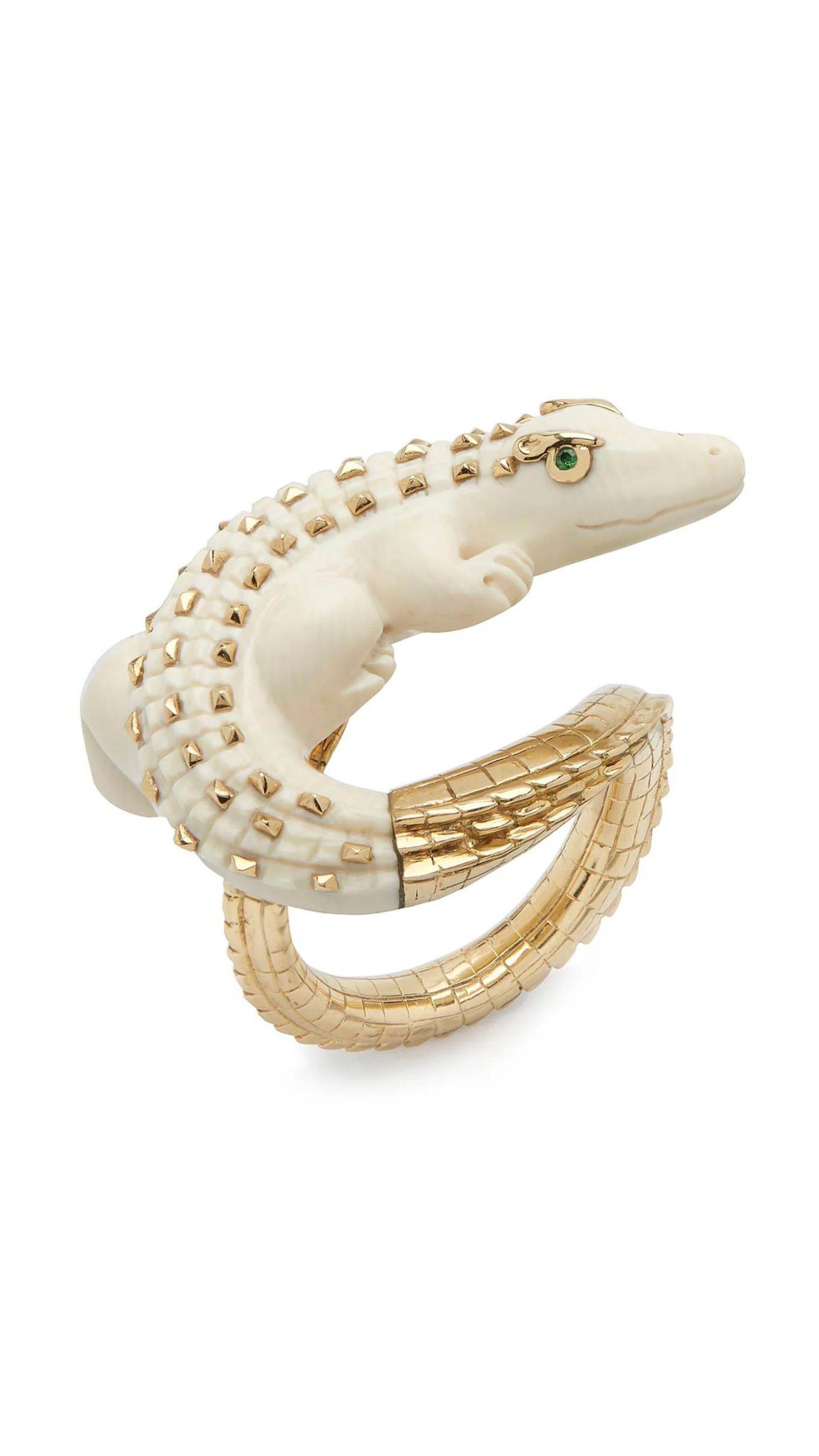Bibi van der Velden Mammoth Alligator Twist Ring. Crafted in mamoth tusk in the shape of an alligator that curves around the finger. The tail is made from 18K gold and the ivory body has 18K gold studs. The ring is shown from the side.