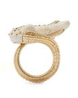 Bibi van der Velden Mammoth Alligator Twist Ring. Crafted in mamoth tusk in the shape of an alligator that curves around the finger. The tail is made from 18K gold and the ivory body has 18K gold studs. The ring is shown from the bottom