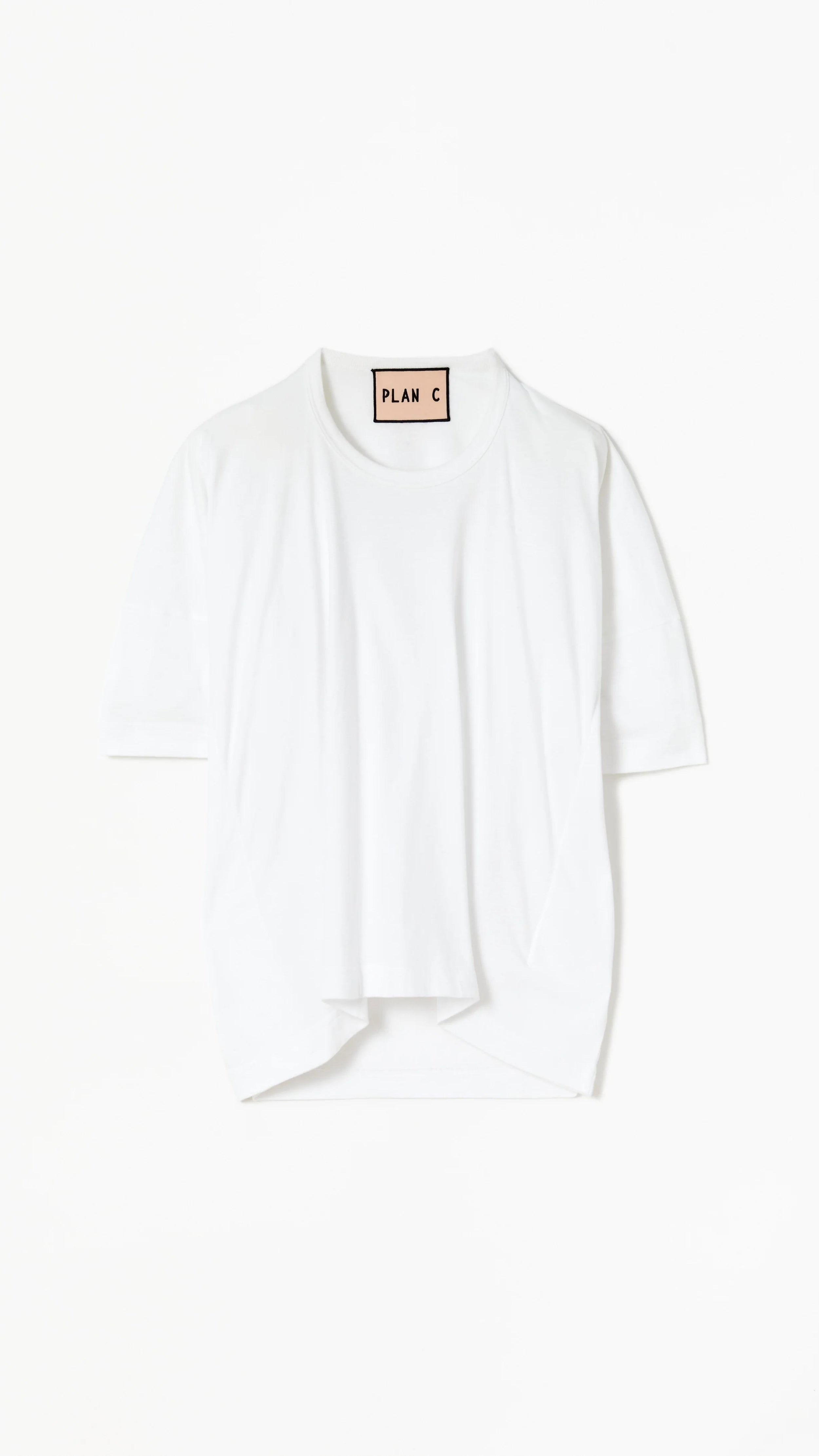 Plan C Draped Back White Cotton Tee 100% cotton, classic white tee with an updated modern draped back. The iconic Bianca patch in bold red adds a discreet accent at the back neckline. Flat product photo.