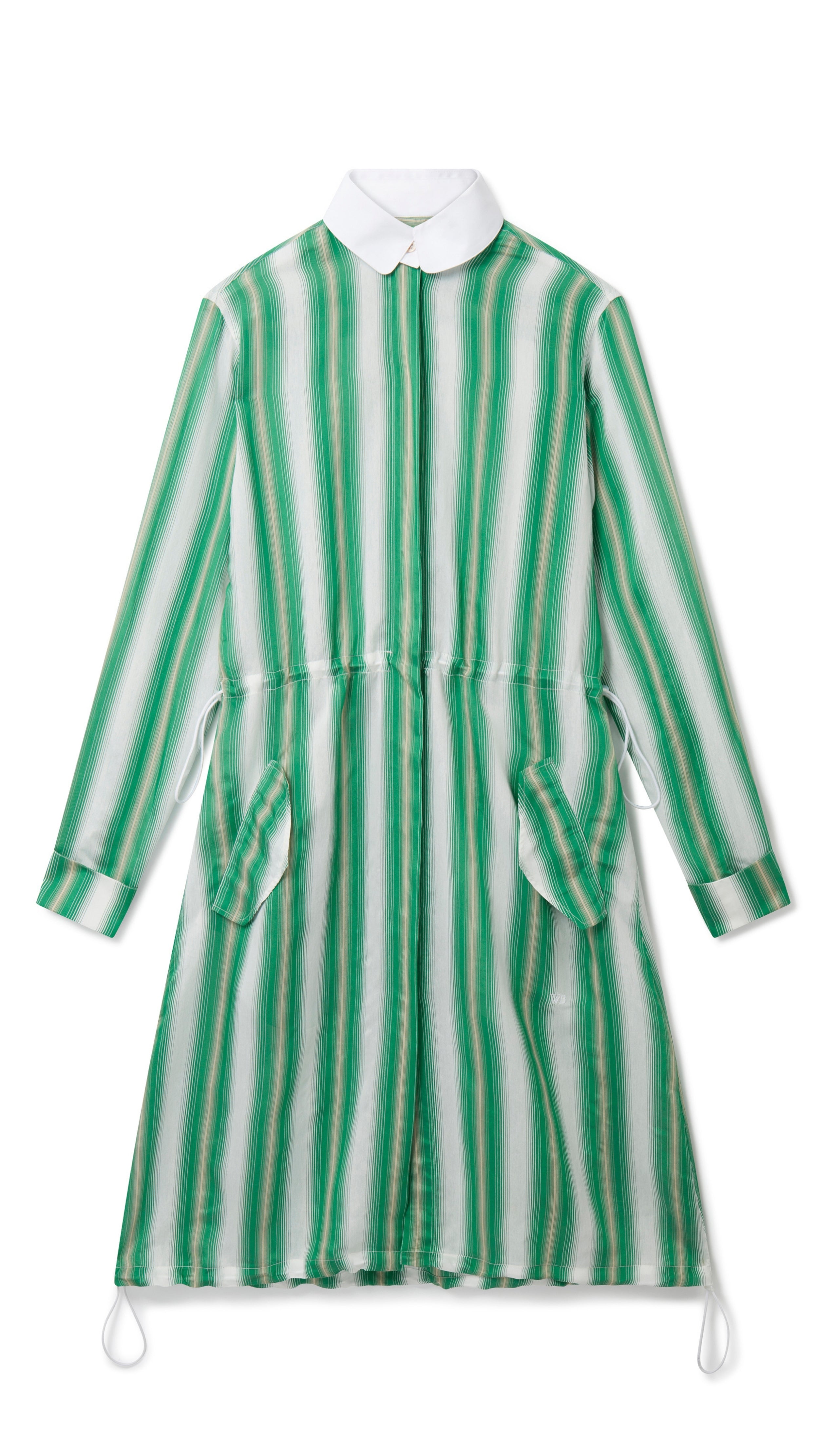 Wales Bonner Balance Dress Made in Italy in a lightweight silk blend. The midi dress has long sleeves, a white collared neck, and green and white stripes. The shirt dress has an adjustable drawstring waist, buttons up the front, and deep front pockets. Product photo shown from the front.
