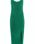 Alejandra Alonso Rojas Machine Knit Dress in Green. Crafted in the softest camel wool it is a form fitting dress with thin straps and falls to midi length. It has a slit to just above the knee on one side. Product photo showing front view.