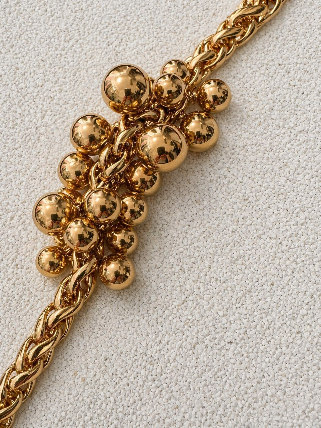 Françoise x Gas Bijoux Stellar Bracelet in gold, full flat lay showing complete bracelet with sphere cluster and chain
