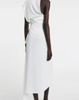 A.W.A.K.E. Mode Asymmetric Sleeveless Draped Top. White asymmetrical top. Beautifully draped in the front and pin tucked, with a slightly open back to one side. Shown on model facing the back