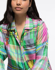 AZ Factory Chromatic Love Silk Blouse. Oversize silk blouse in multi color plaid with Alber Elbaz sketches on top. Button up front with rounded collar. Shown on model facing front.
