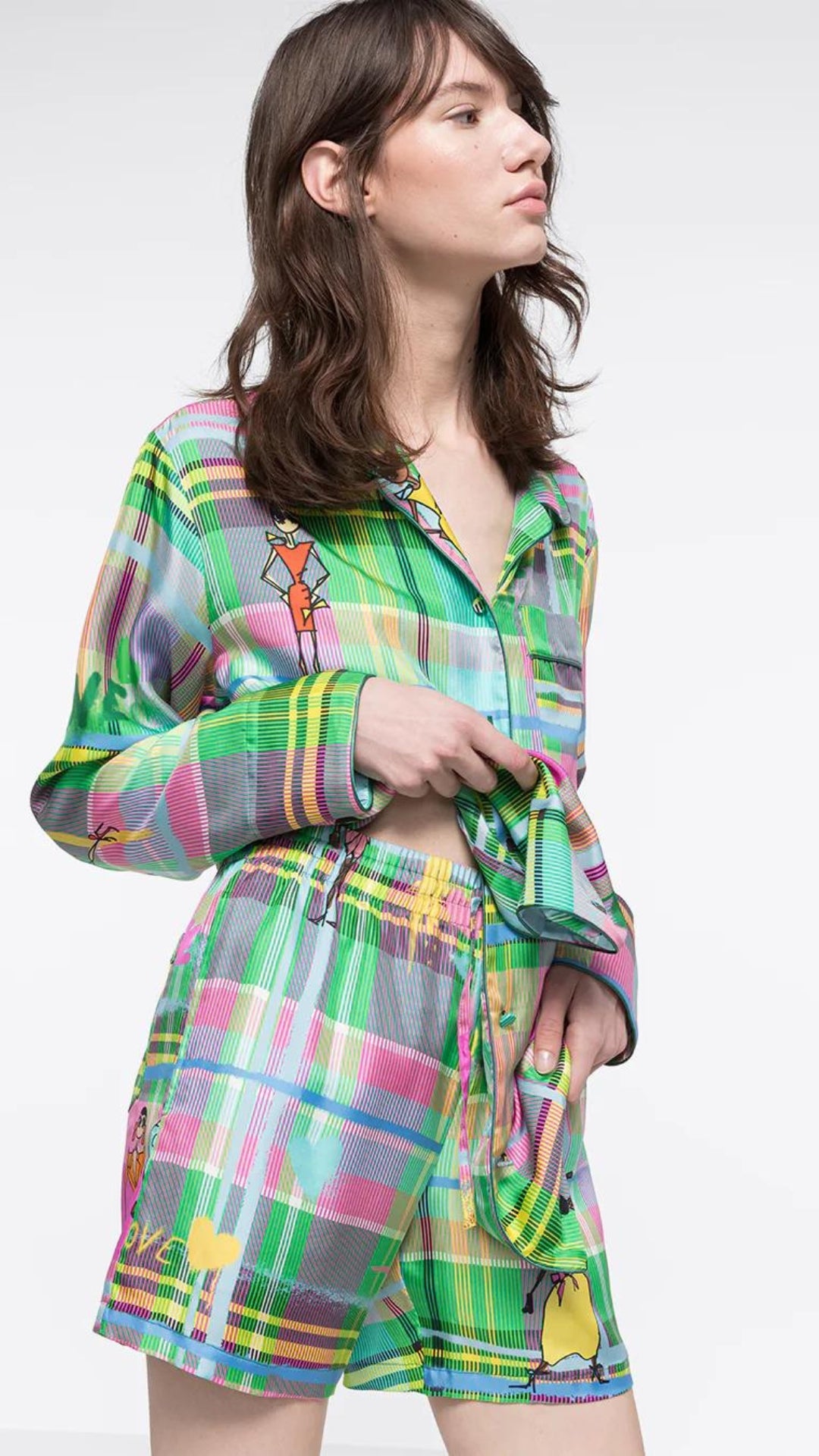 AZ Factory Chromatic Love Silk Blouse. Elastic waist silk shorts in multi color plaid with Alber Elbaz sketches on top. Shown on model facing front.
