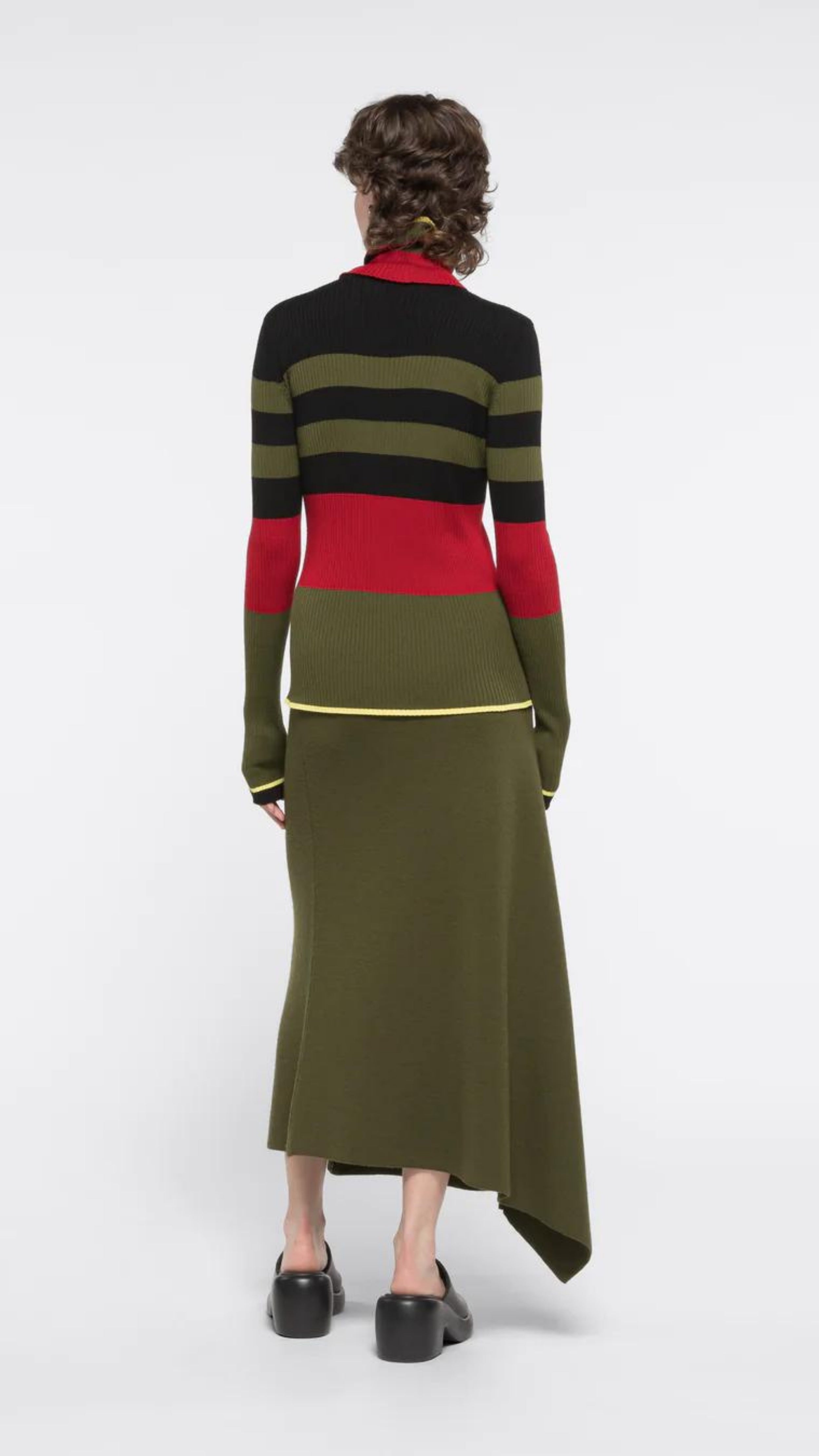 AZ Factory Colville Molly Molloy Lucinda Chambers, Ribbed Midi Skirt Constructed from a ribbed knit material, this skirt features an asymmetrical midi length, with a yellow line across the front. Shown on model facing back