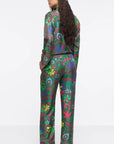 AZ Factory Silk Trousers in Motly Paisley. Pajama style silk pants made in Italy. Featuring a colorful motly paisley print with Alber Ebaz sketches. Shown on model facing back.