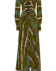 Altruzarra, Helenos Dress. 100% silk and shibori dyed in beautiful olive green and ecru pattern with a highlight pop of blue/green. It features a v neckline, long sleeves and a full skirt with front cut out and twist details. This pre-fall 2023 dress is shown from a front view. Available at experience 27 in madrid, spain.