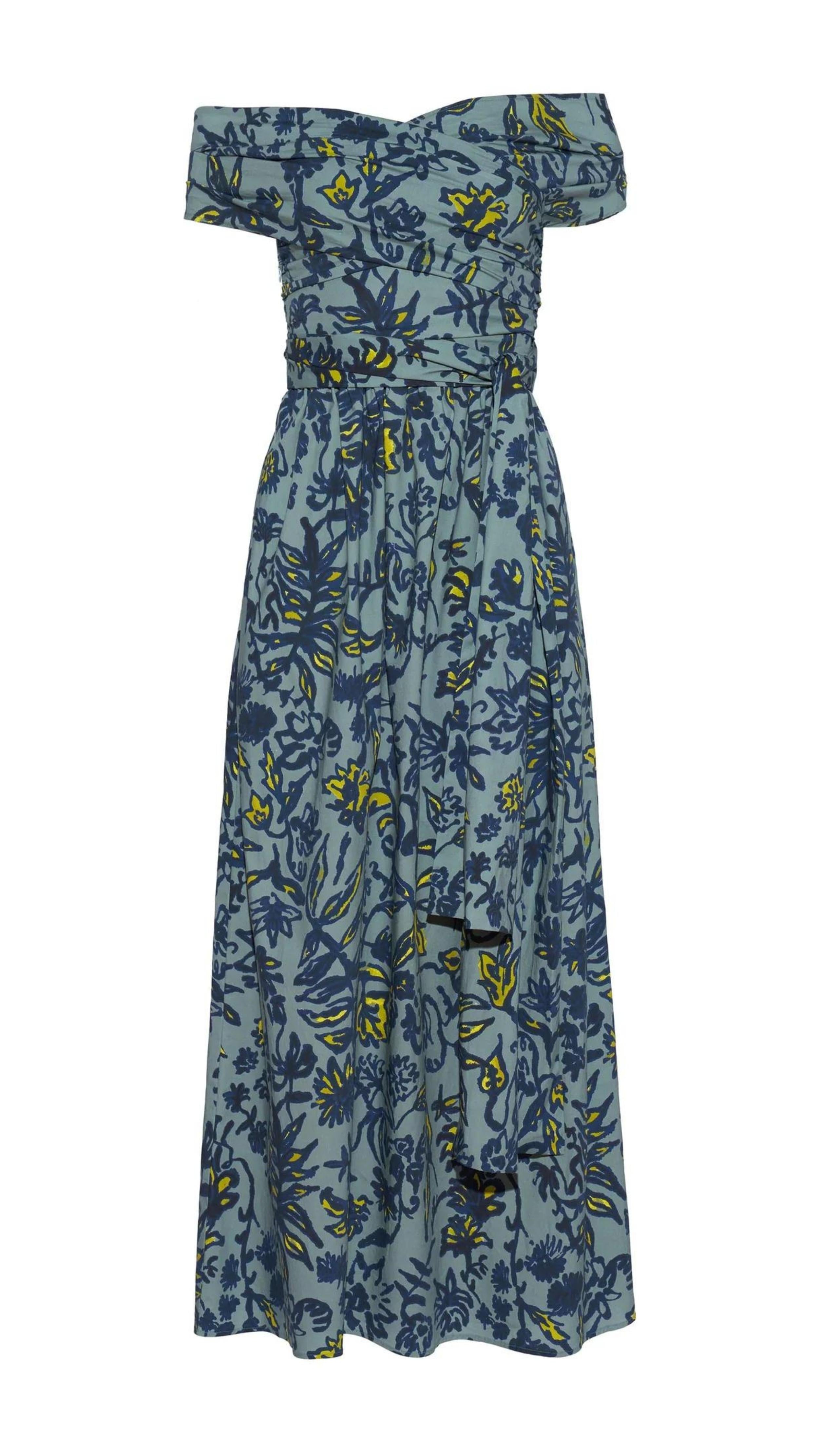Altuzarra Corfu Dress in Stormcloud Shibori Flower. Relaxed off the shoulder cotton dress in beautiful grey blue, dark blue and yellow floral pattern. Wrap around style top with wrap around belt flows into the straight midi length skirt. Shown facing front. Available at experience 27 in madrid spain.