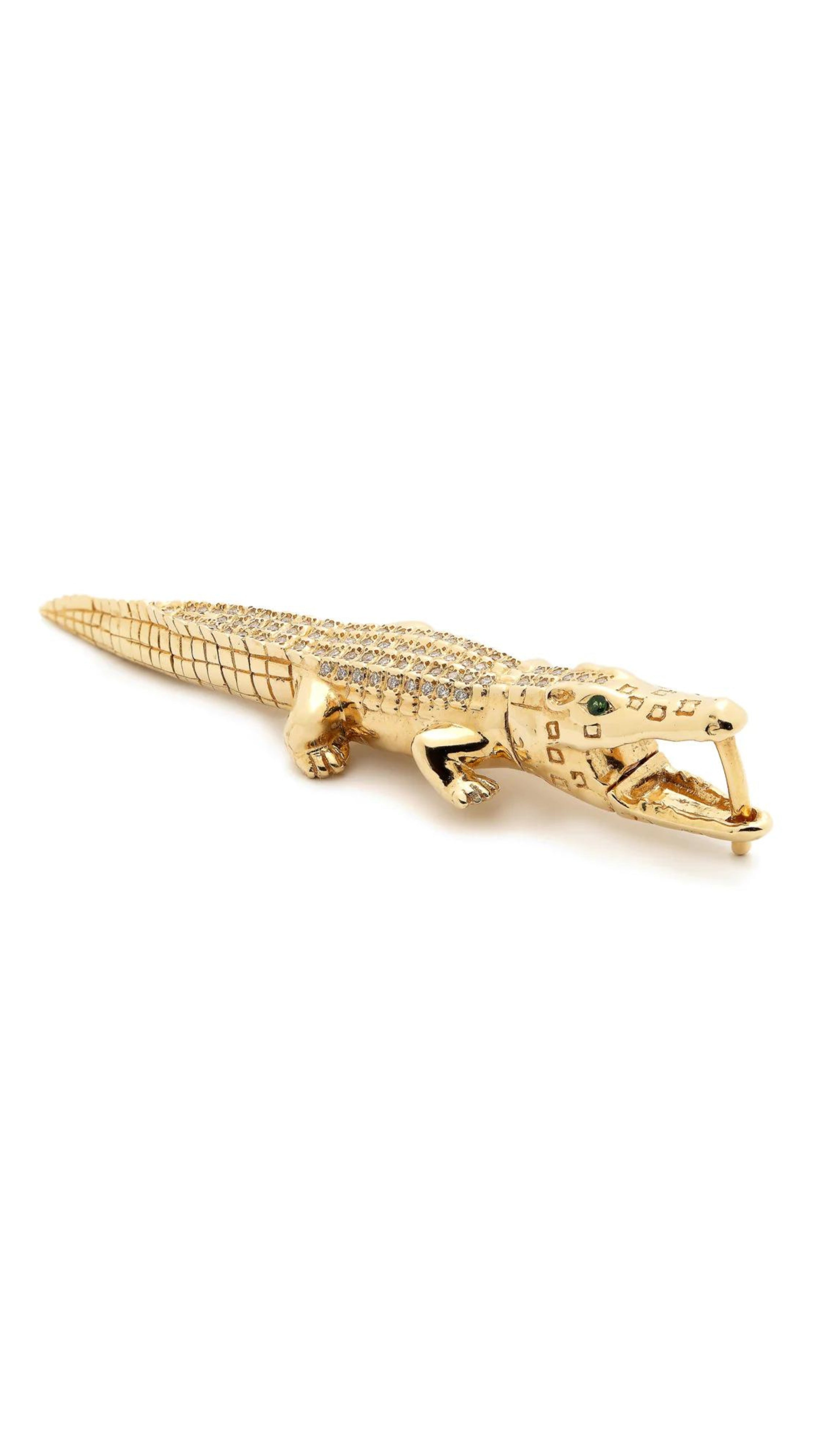 Bibi van der Velden, Alligator Bite Diamond Earring. Single alligator earring crafted in 18K gold with white diamond pace body. Shown sitting.