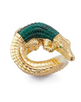 Bibi van der Velden Alligator Twist Ring in Malachite. An intricately carved ring crafted from 18K Gold with a malachite stone alligator body. The alligator is twisted from tail to nose and the ring is set beneath the scultpure. Photo shown from the top view.