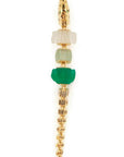 Bibi van der Velden Green Gradient Alligator Vertebrae Bite Earring. Crafted in 18K yellow gold, the alligator's body is formed by White Quartz, Green Amethyst, Green Agate while the head and tail are in solid 18K gold.  Photo shows earring from above.