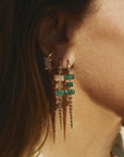 Bibi van der Velden Green Gradient Alligator Vertebrae Bite Earring. Crafted in 18K yellow gold, the alligator's body is formed by White Quartz, Green Amethyst, Green Agate while the head and tail are in solid 18K gold.  Photo shows earring on model.
