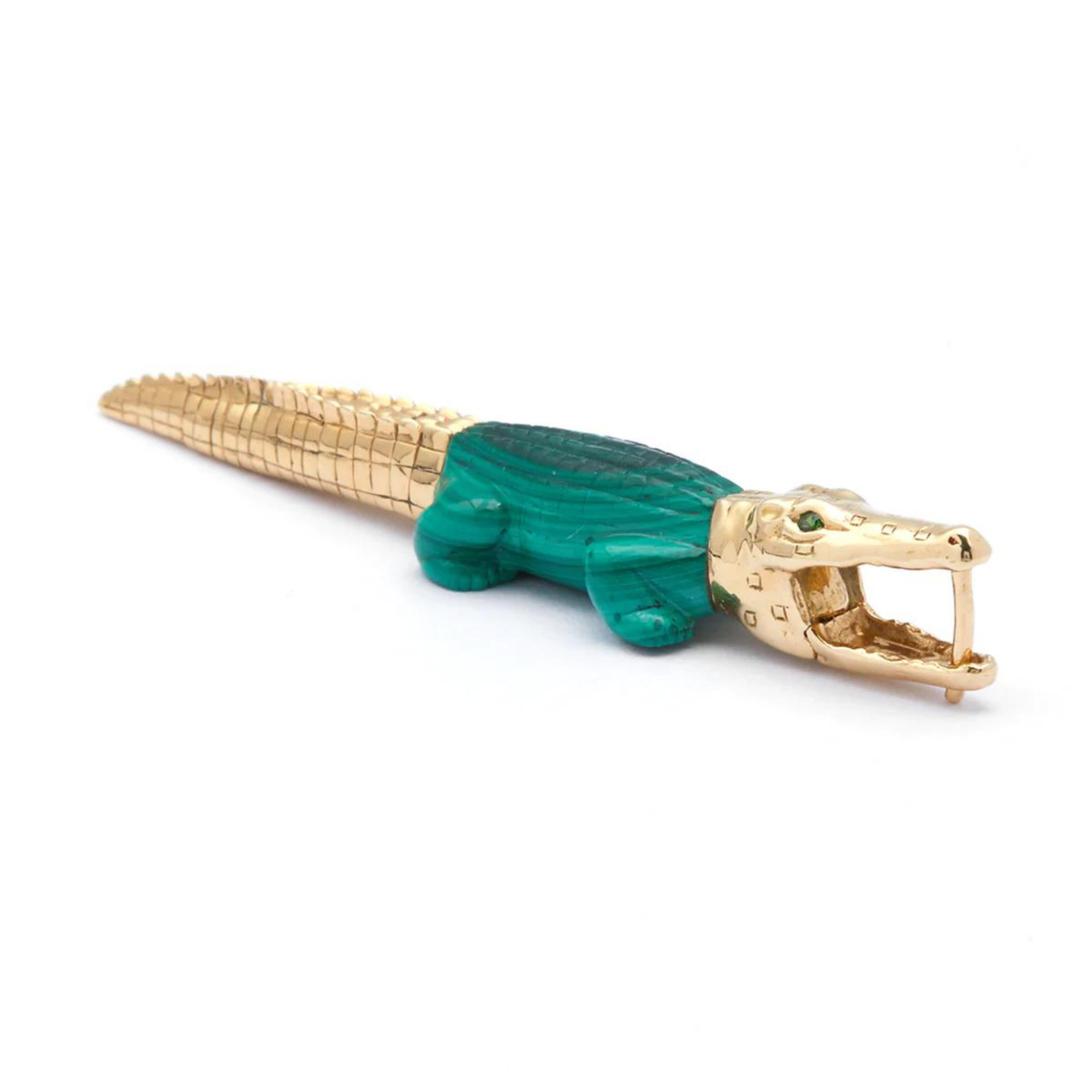 Bibi van der Velden Malachite Alligator Earring. Hand-carved to replicate the body of a mini alligator, the 18K yellow gold earring is adorned with tsavorite stones and a malachite carved body.  Shown from the side view.