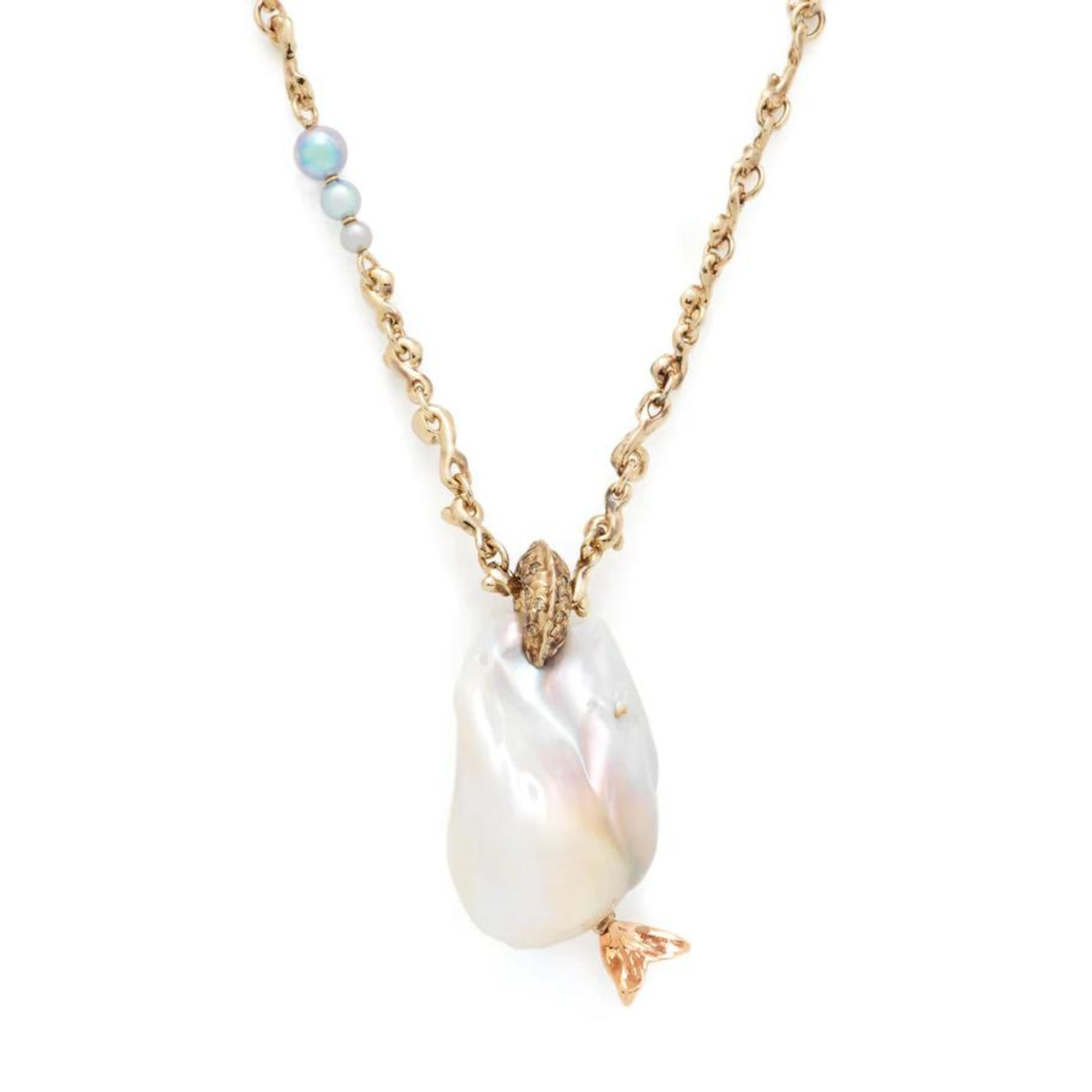 Bibi van der Velden Mermaid Pearl Pendant on Waves Chain. A South Sea baroque pearl has a mermaid's tail crafted from 18k white and rose gold woven into it. Brown diamonds embellish it's tail and the pearl is set on an 18k white gold chain with round grey pearls of varying sizes.