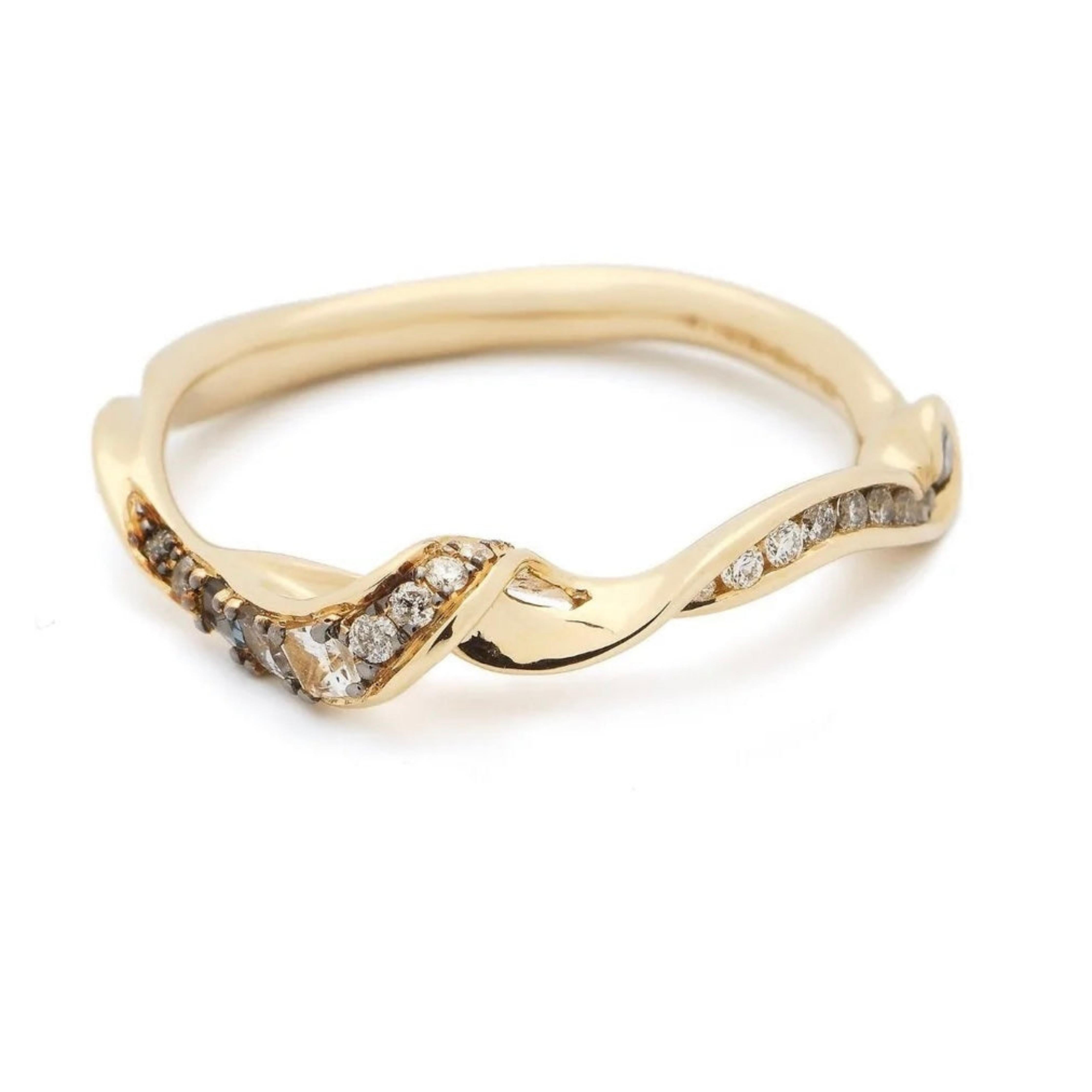 Bibi van der Velden Inhale Stackable Ring A Stackable Ring crafted from 18K white gold with pale yellow tones and enhanced with white, grey, and blue toned diamond and spinels to form an organic shape inspired by smoke. Photo shown from the side.