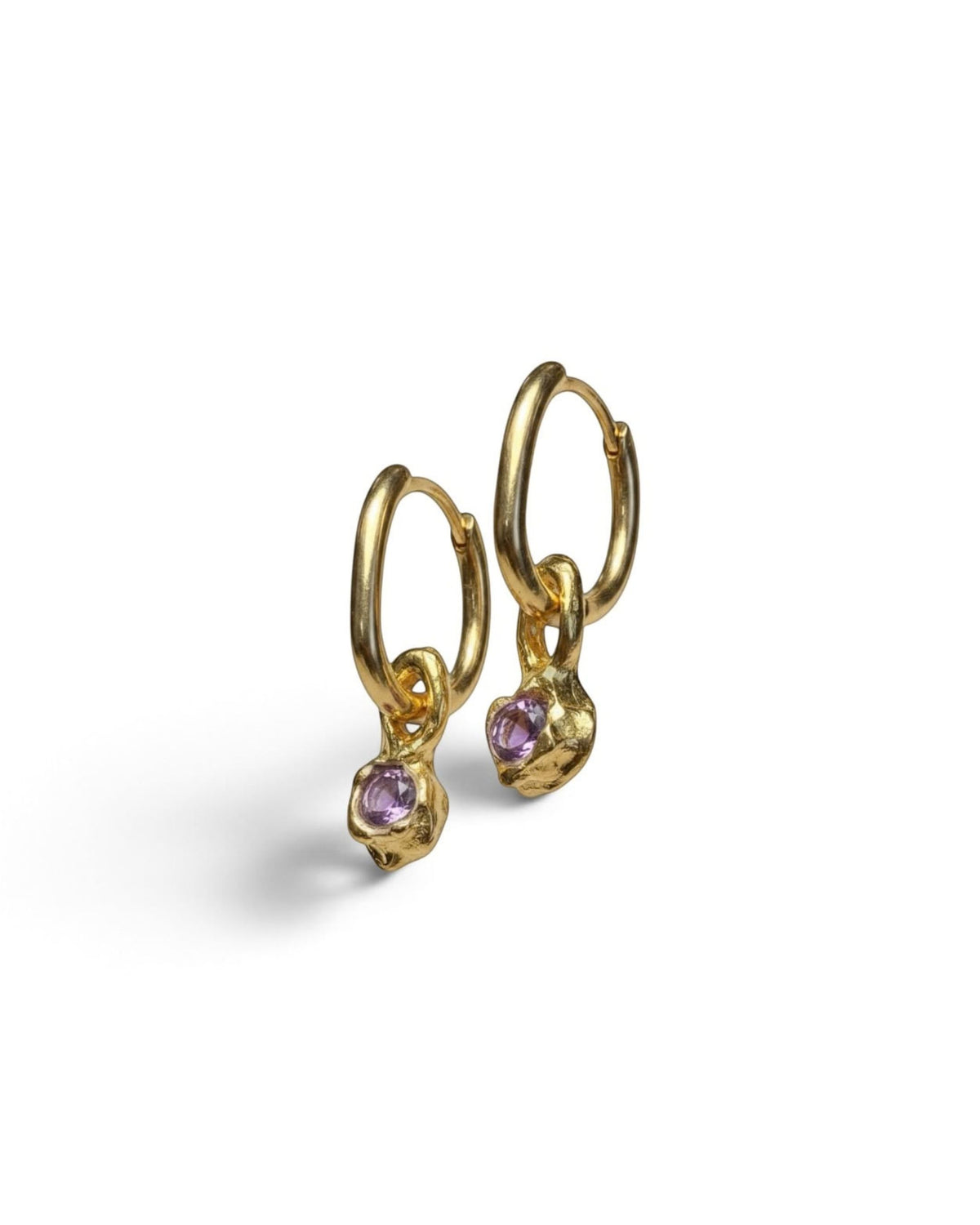 Two 18k gold vermeil hoop earrings with faceted amethyst drops, side view on white background