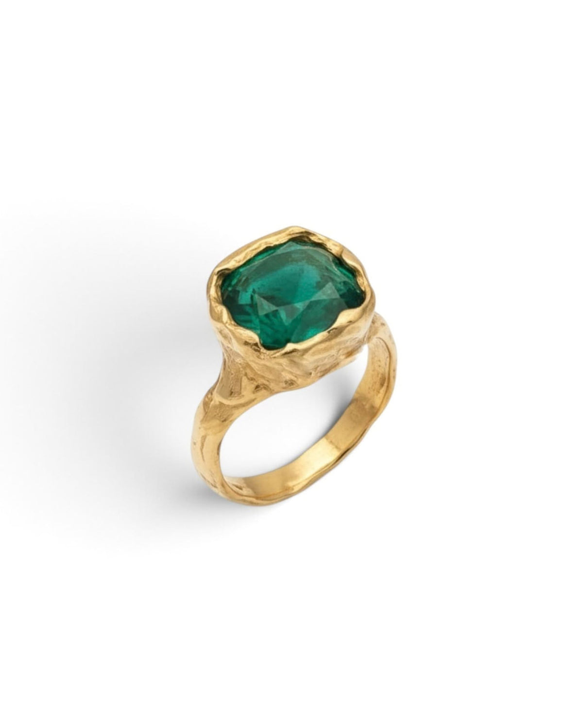 Angled view of an 18k gold vermeil ring with a large faceted emerald-green stone, on white background