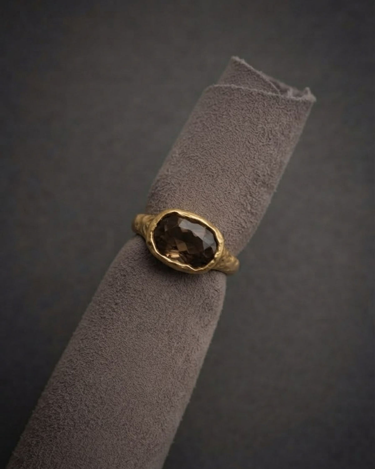 Camila D. Daneri Smoky Quartz Ring in gold vermeil, close-up styled on fabric