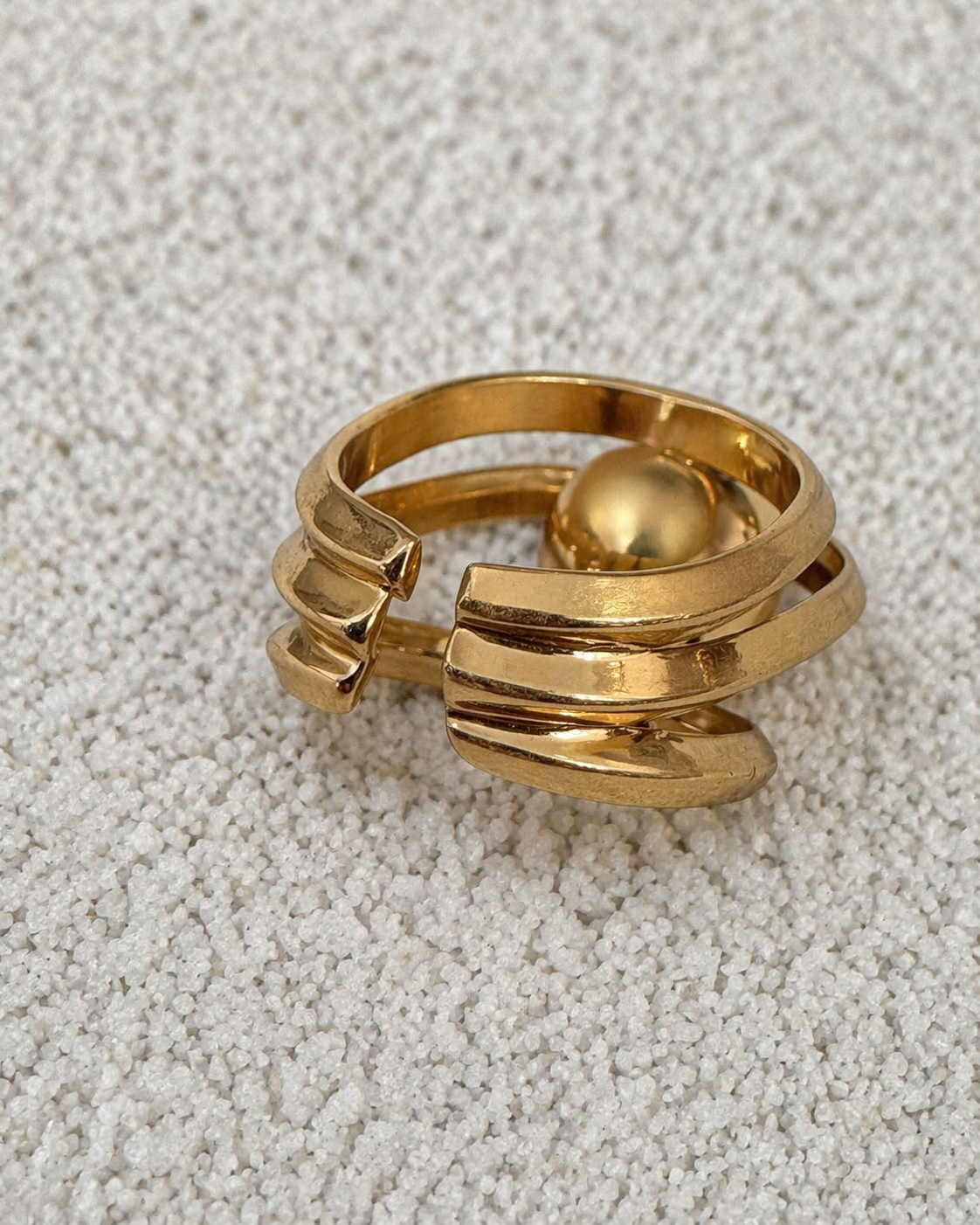 Françoise x Gas Bijoux Stellar Ring in gold, three-quarter angle showing band depth and sphere detail