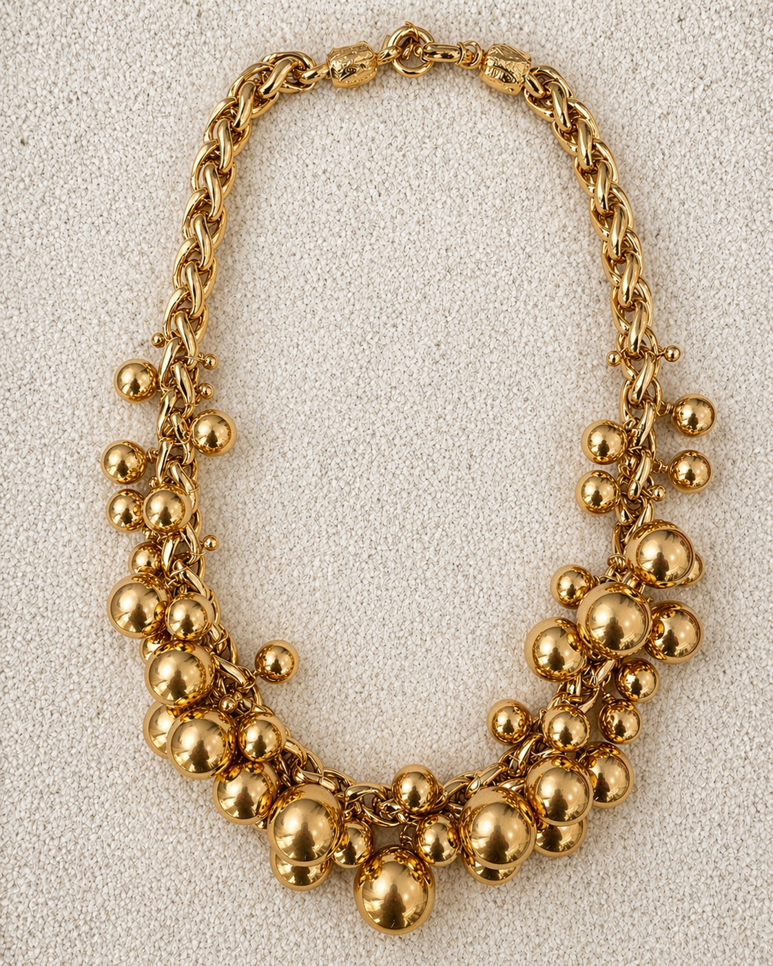 Françoise x Gas Bijoux Stellar Necklace in gold worn on neck, showing full sphere cluster collar effect