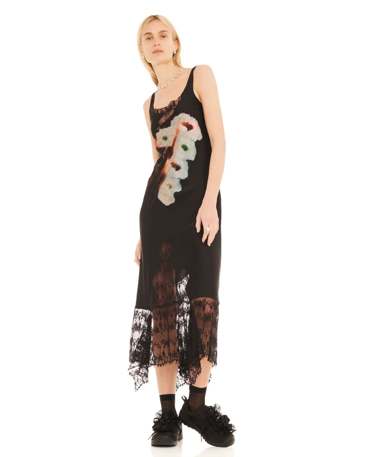 Collina Strada Hollow Blossom Anemone Dress showing its bias-cut silhouette and asymmetric hem
