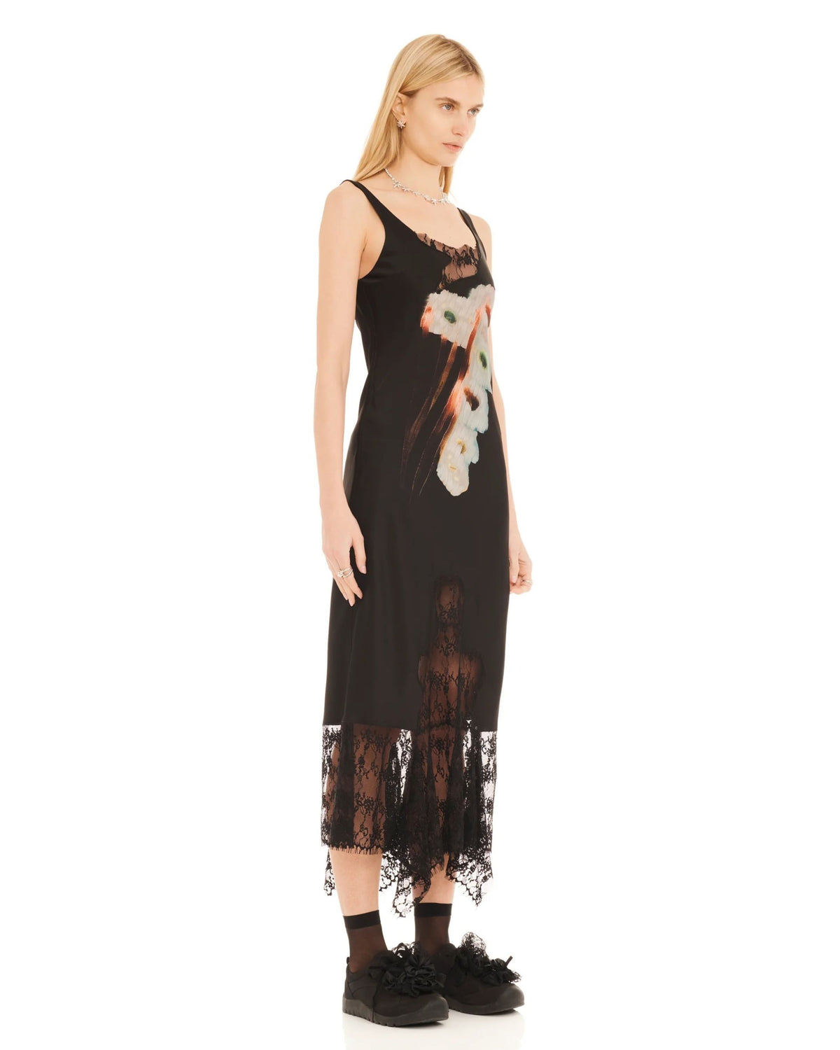 Collina Strada Hollow Blossom Anemone Dress with floral print and lace panels, three-quarter view