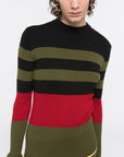 Colville AZ Factory Molly Molloy and Lucinda Chambers, Color Block Crewneck Sweater with Snood. Long sleeve sweater with crew neckline in varying stripes of black, olive and red with high light of yellow at bottom hem and cuffs. Shown on Model facing front.