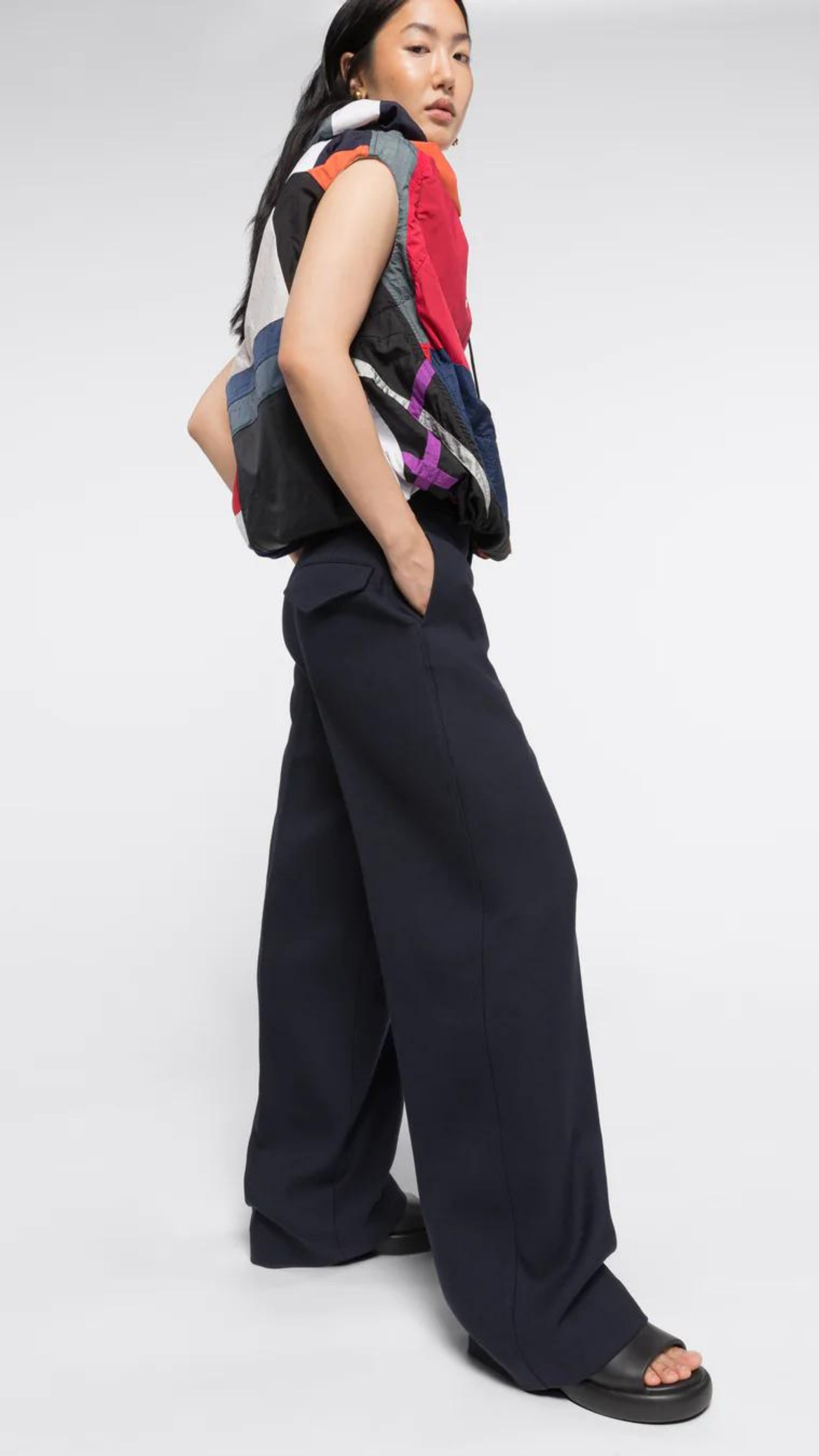 Colville AZ Factory Lucinda Chambers Molly Molloy, Double Wool Wide Leg Pants in Navy. Loose fitting boyfriend sit trouser pants. Crafted from navy blue wool in Italy. Shown on model facing to the side..