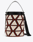 AZ Factory Colville Molly Molloy Lucinda Chambers, WOVEN CABRAS BAG  The Cabras Bag is woven in Wayuu Colombian and finished with Italian leather craftsmanship. Its ecru and burgundy diamond pattern is enhanced with black leather trim and a long black tassel. Front view.
