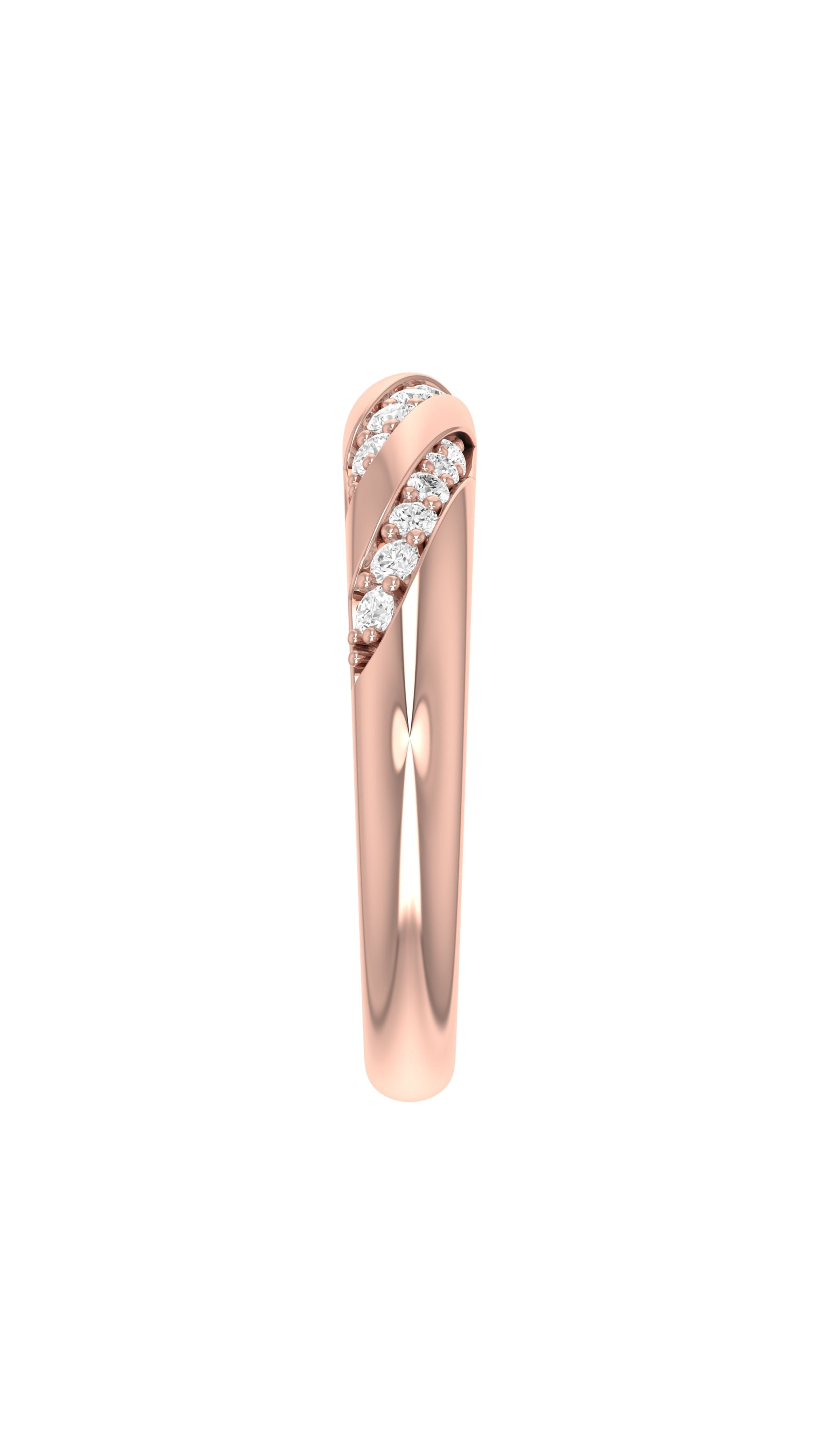 Conde de diamante Elisa ring. The Elisa Ring features a stunning twist of 18K rose gold, adorned with a pave of sparkling diamonds. Delicately rounded and elegant. Shown from the side view.