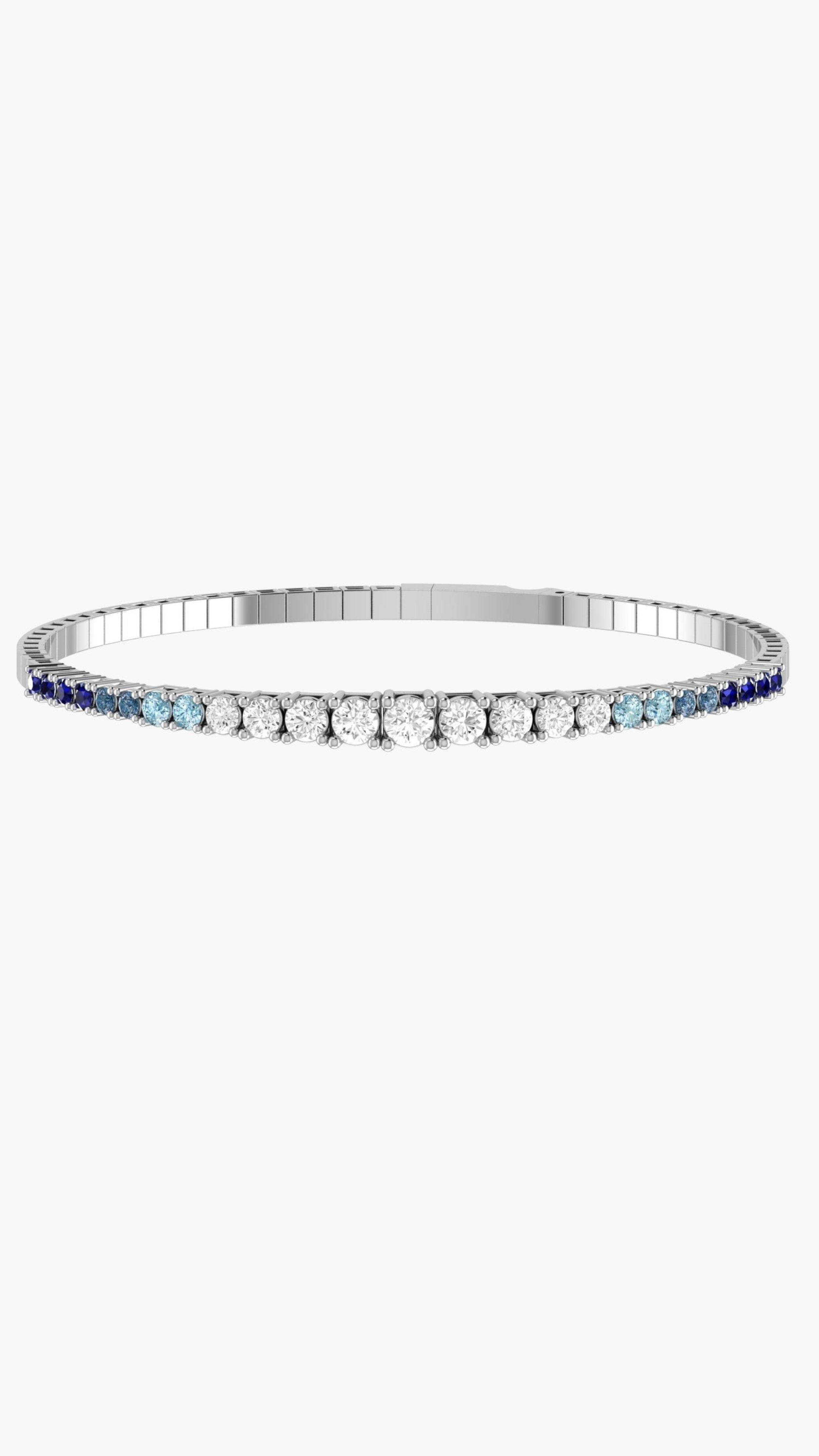 Condé de Diamante Sapphire Degradé Tennis Bracelet. whilte gold flexible tennis bracelet with diamonds and an ombre of blue sapphires. Product photo from the front.