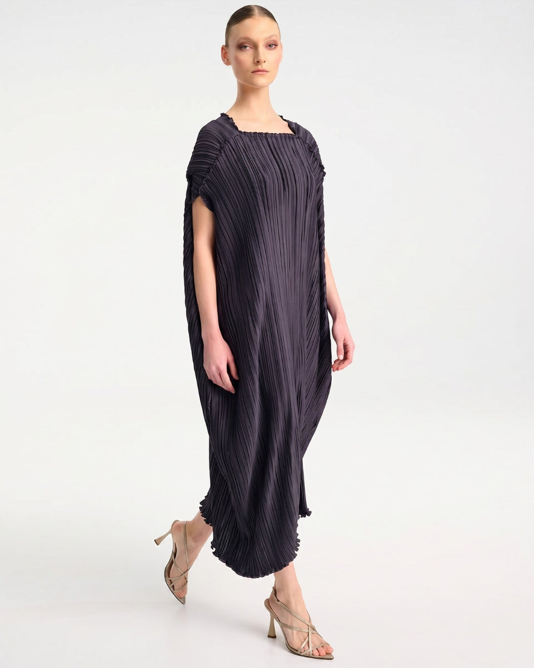 Daphne Valente Esthis Kaftan in Ink — side view in motion showing cocoon shape