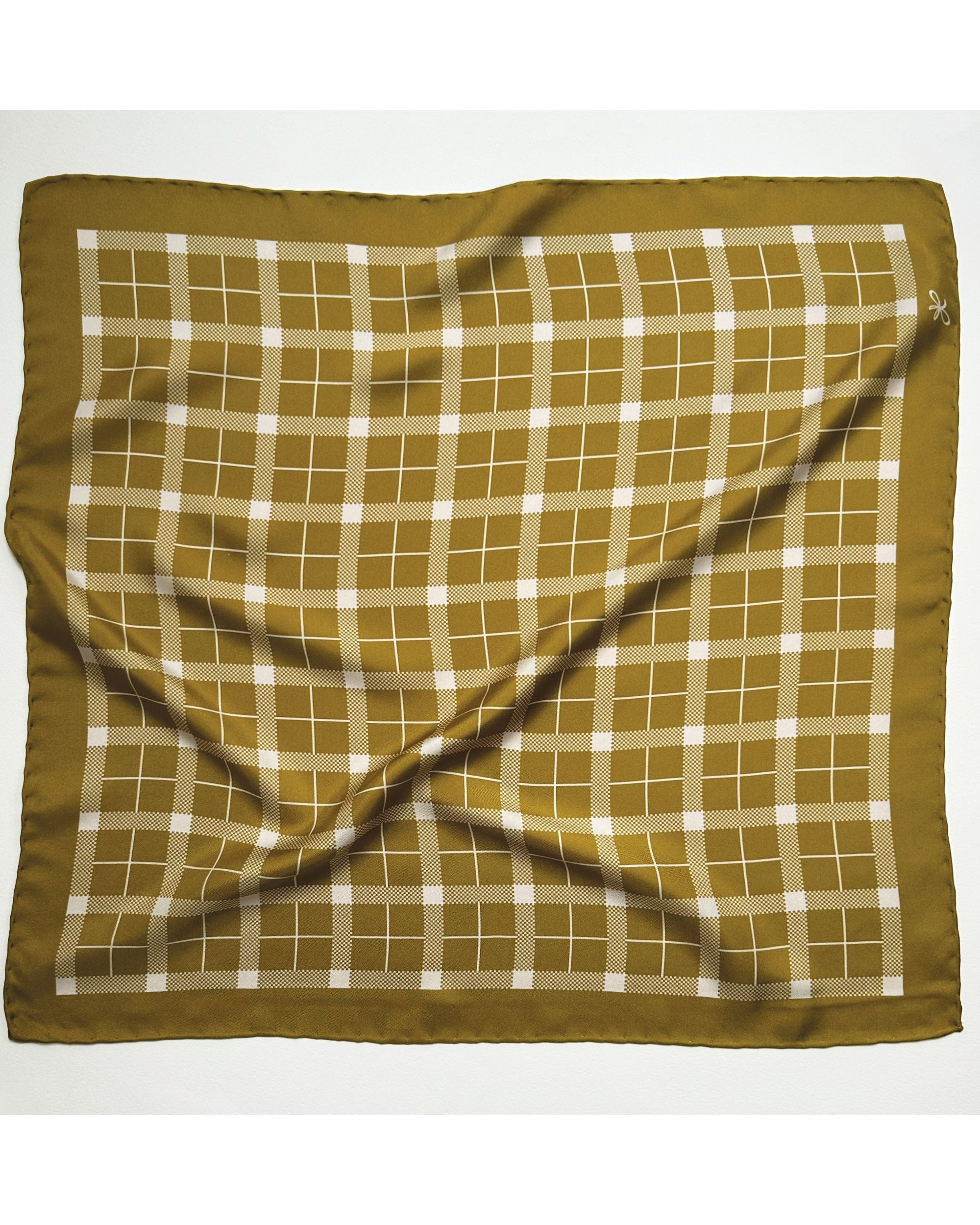Square mustard tartan silk scarf laid flat