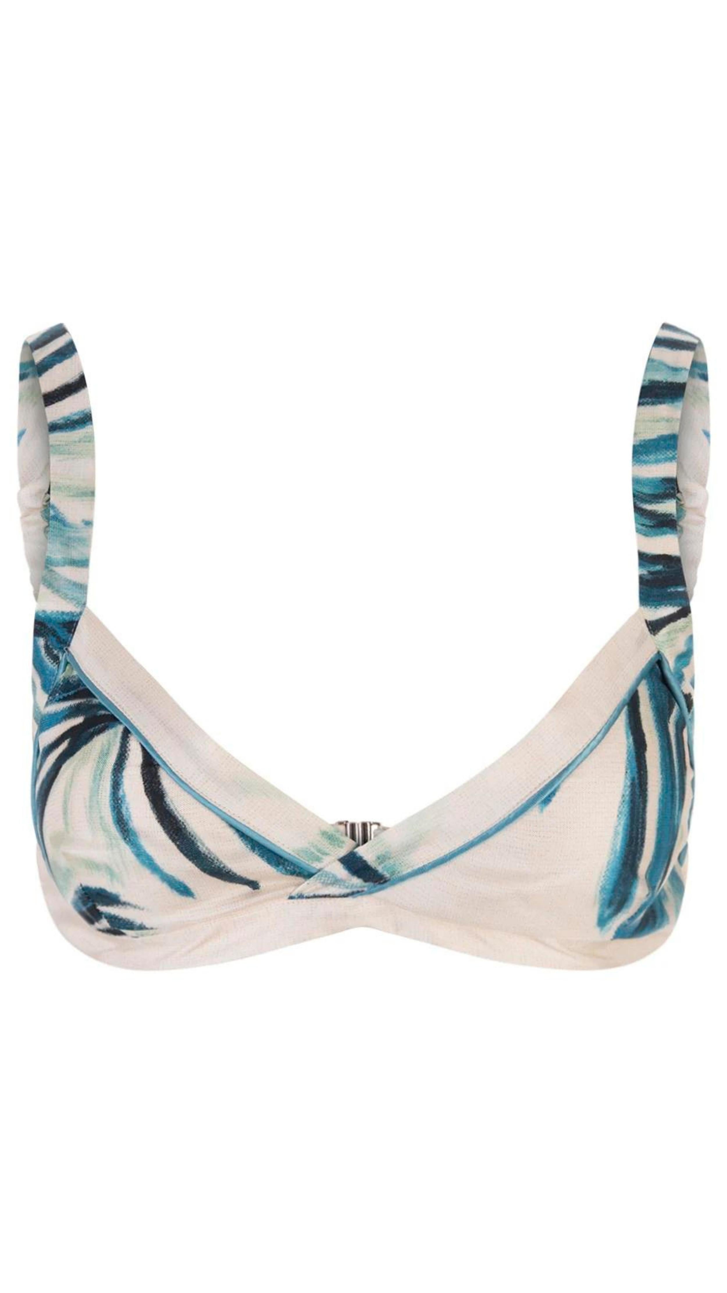 For Restless Sleepers Aglaia Silk Bralette. 100% silk summer silk top in white patterned with shades of blue and green palm leaves. Elastic straps and hook closures in the back. Front product photo.