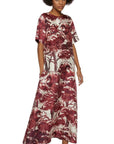 For Restless Sleepers Criso Dress PICTORIAL TREES IVORY BORDEAUX. Silk loose fitting a-line dress with half sleeves. Midi dress with burgundy trim at neck, sleeves and hemline. Shown on model facing front.