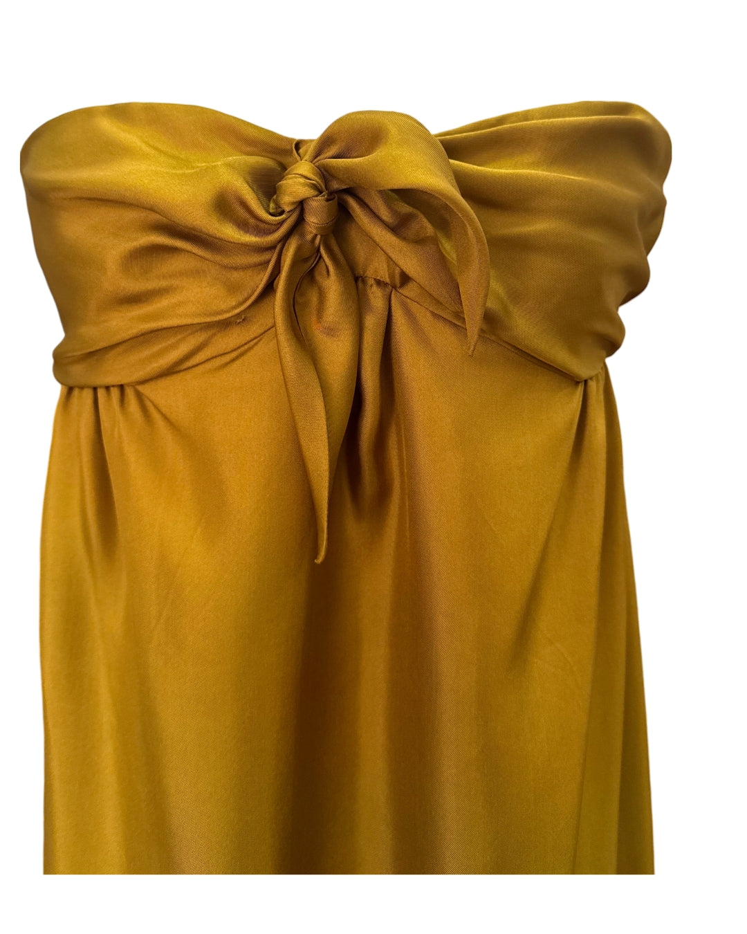 Close-up of sculptural knot and gathered bodice on Françoise Lucie Dress in gold silk