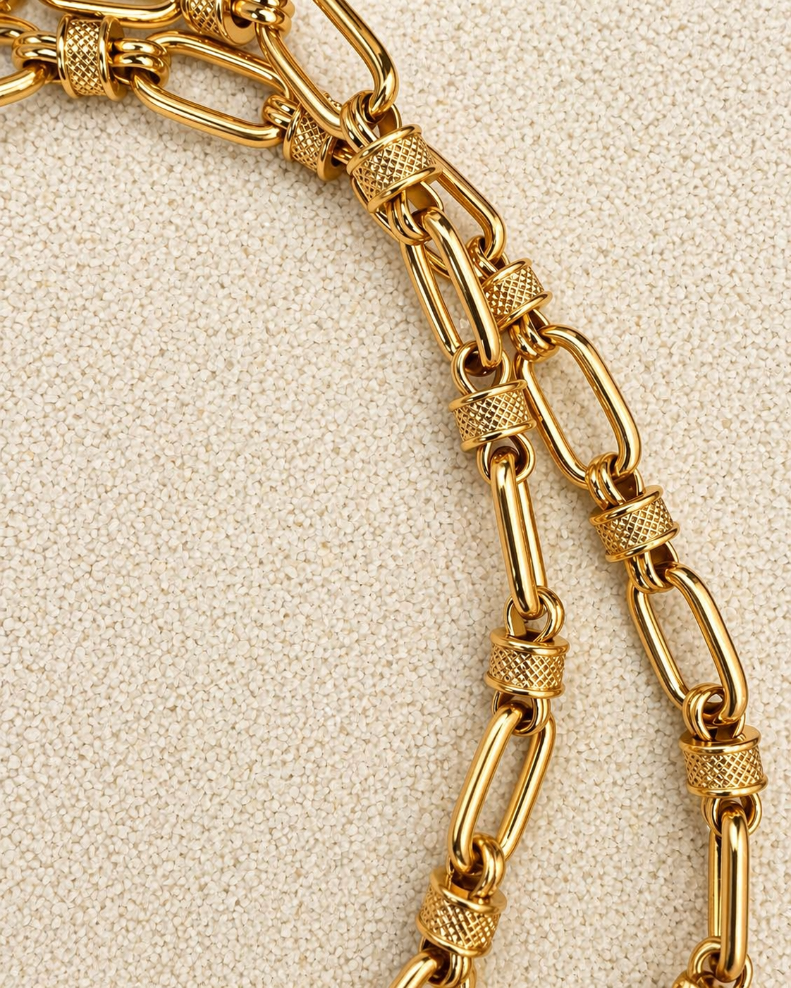 Aura Pendant close-up showing unique natural patterning of black and white mineral glass stone in gold setting