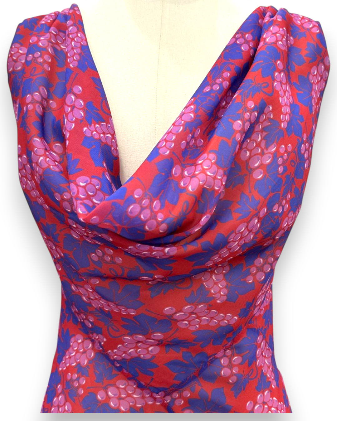 Henri Paris, Floor Length Grape Print Mousseline Gown, close-up of draped cowl neckline in grape and vine printed mousseline, Experience 27
