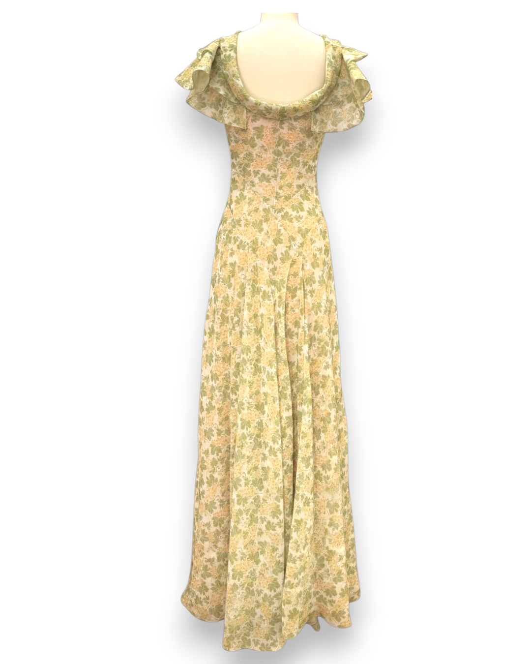 Henri Paris, Floor Length Green Floral Mousseline Gown, three-quarter side view of ruffle collar and flowing bias-cut mousseline skirt, Experience 27