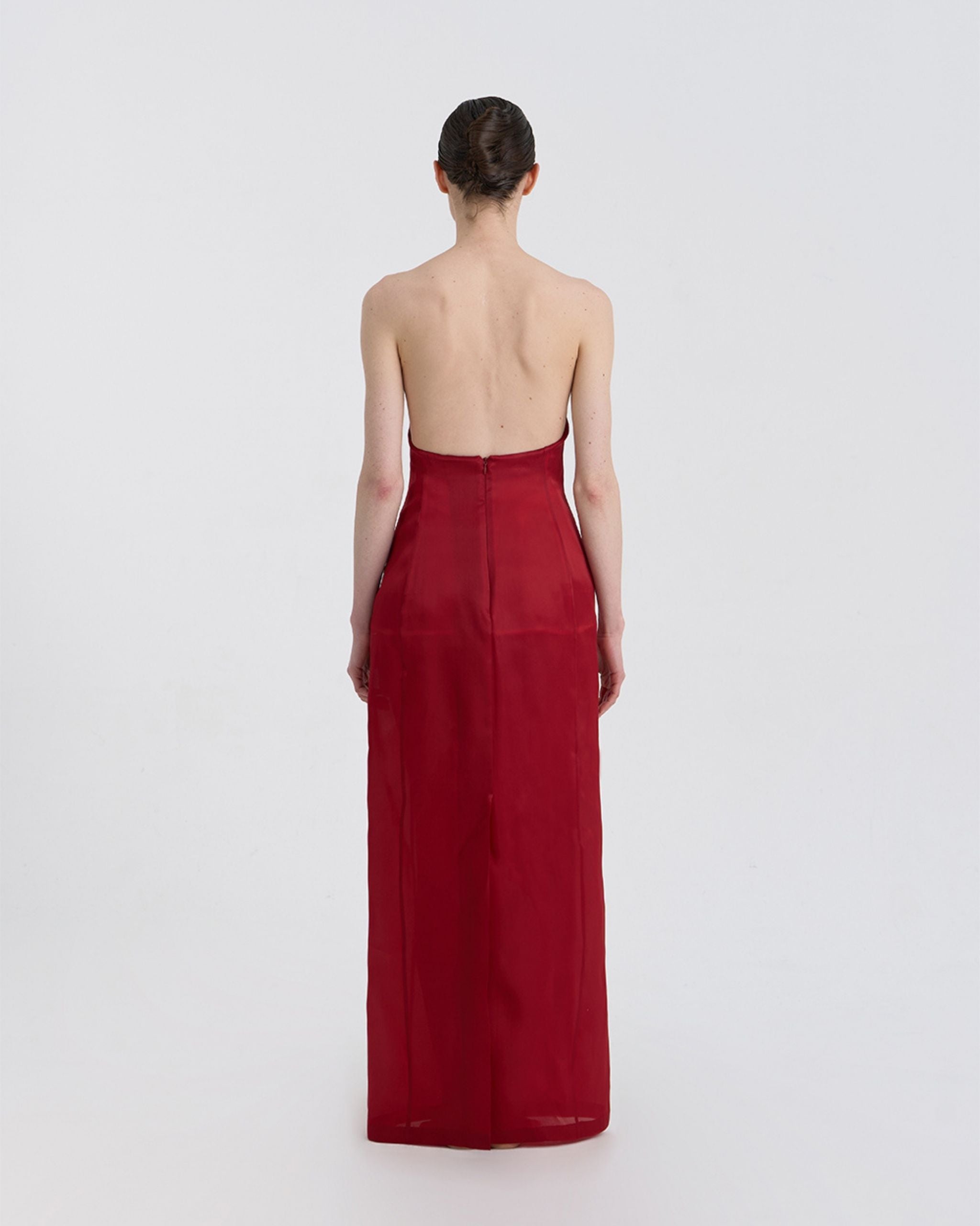 Back view of JINSUN Corset Silk Gown revealing open back and concealed zip closure.