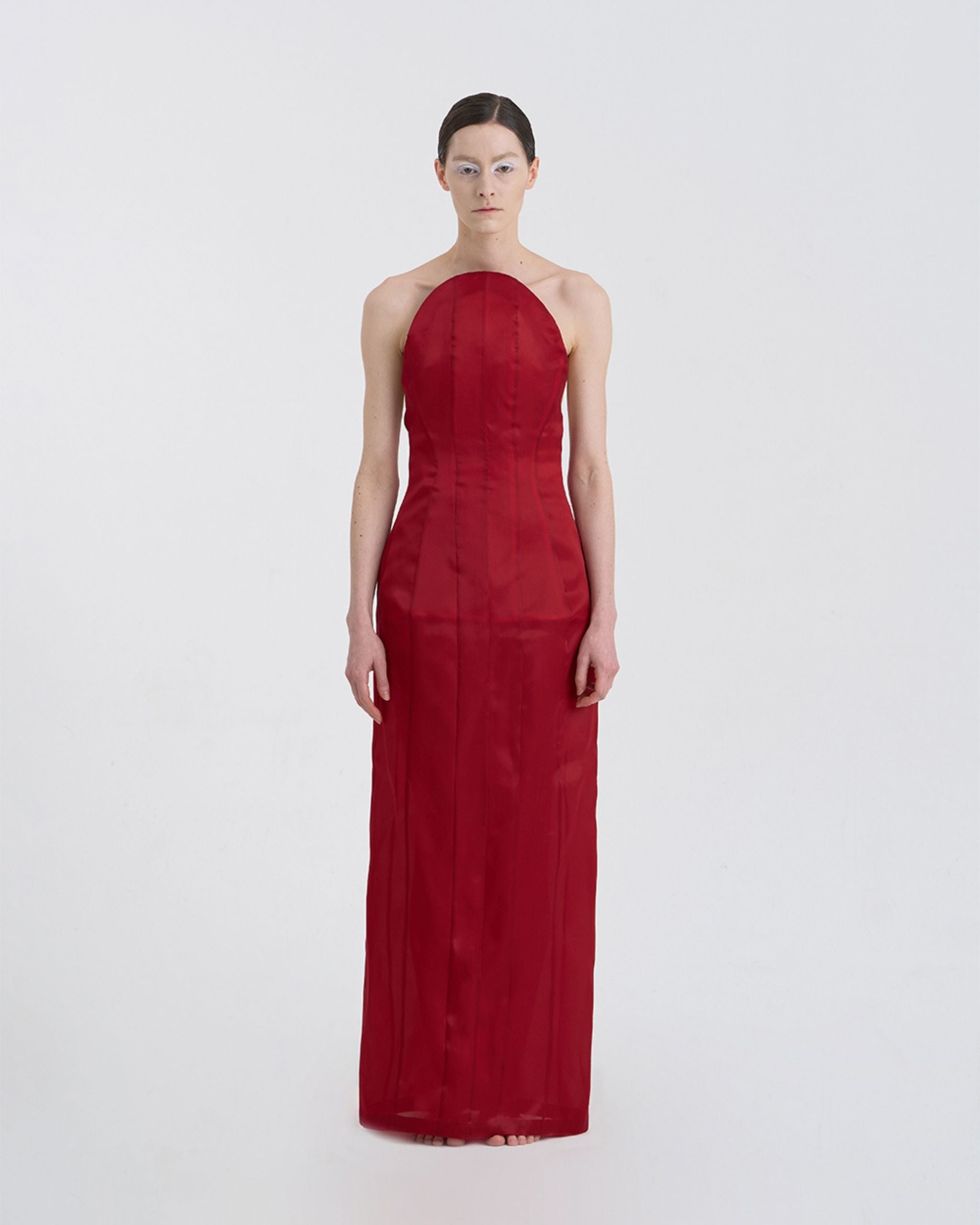 Front view of JINSUN Corset Silk Gown in deep red silk with sculptural strapless neckline and fitted silhouette.
